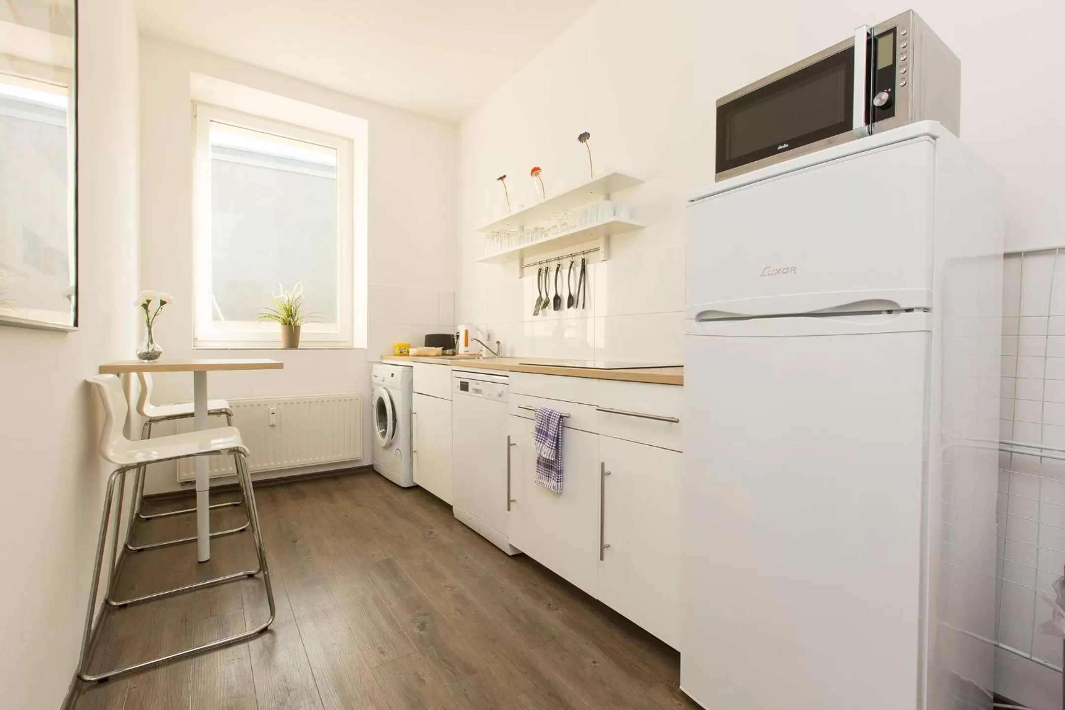 Kitchen or kitchenette in T3 Hotel Cityloft