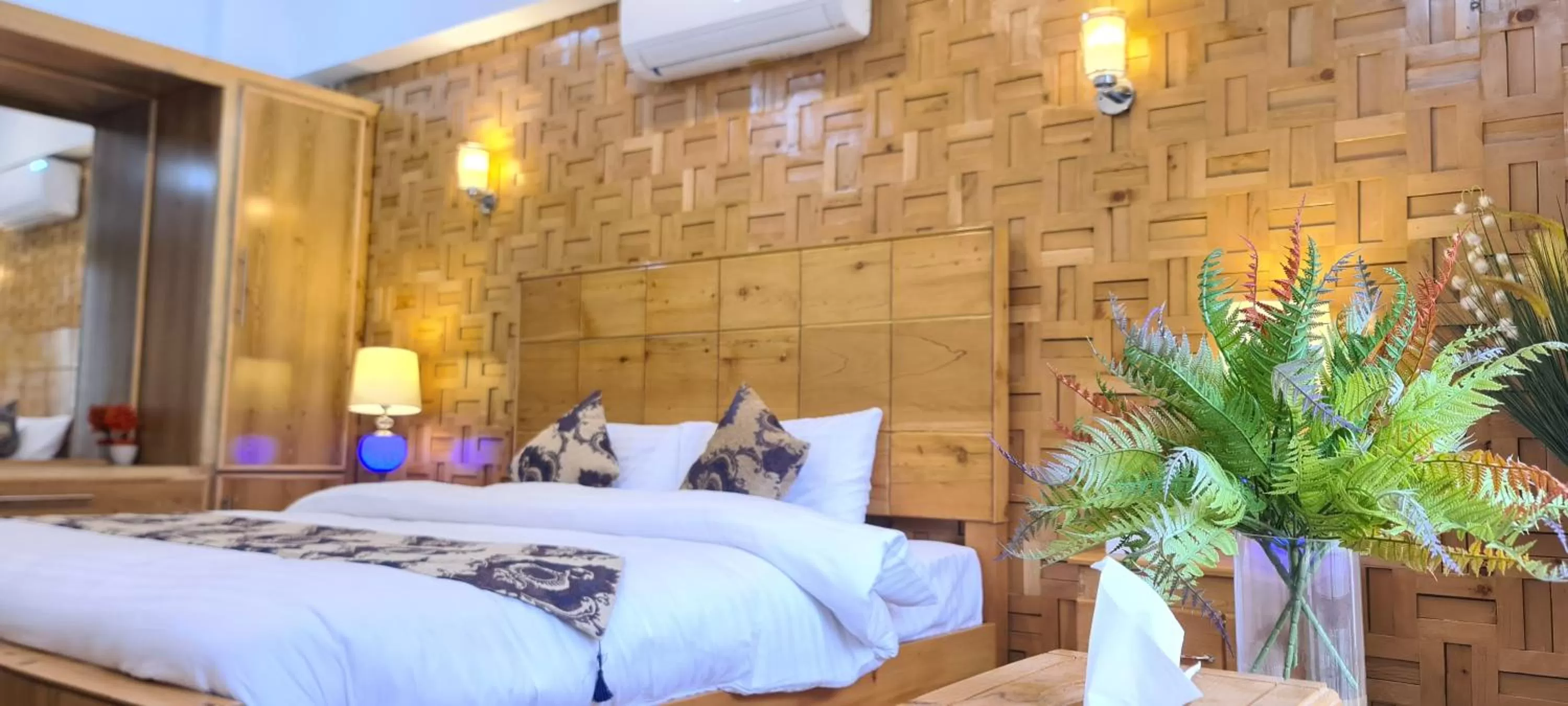 Bed in Indus Lodges Gilgit