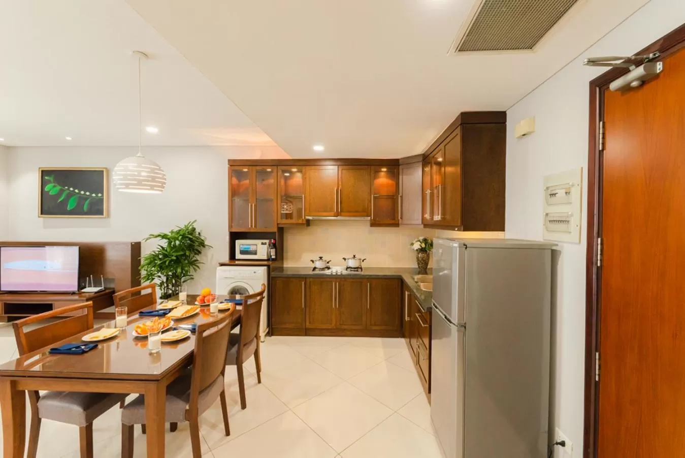 Kitchen or kitchenette in Lancaster Ho Chi Minh Serviced Apartment Official