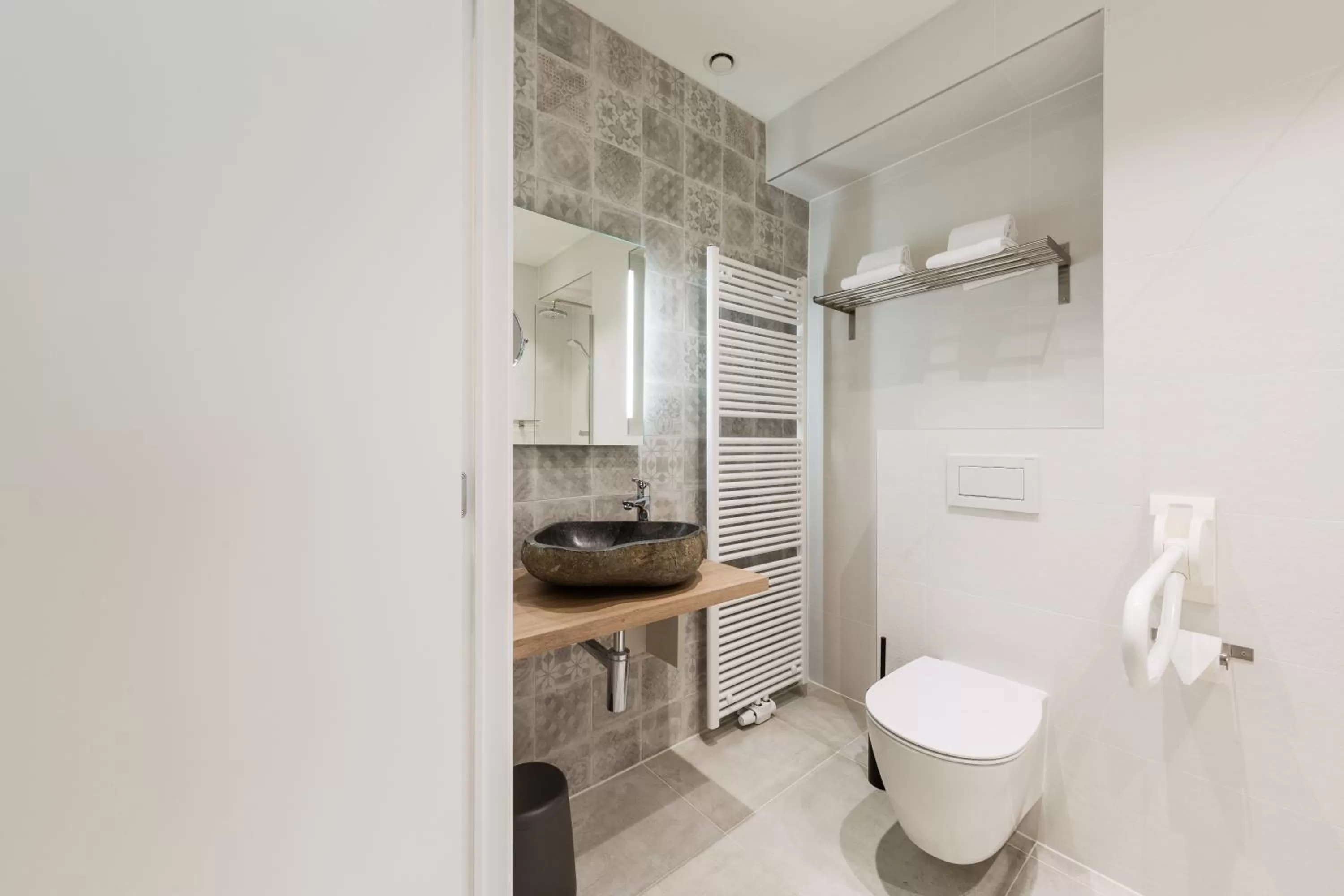 Toilet in Beach Hotel Helios by CW Hotel Collection