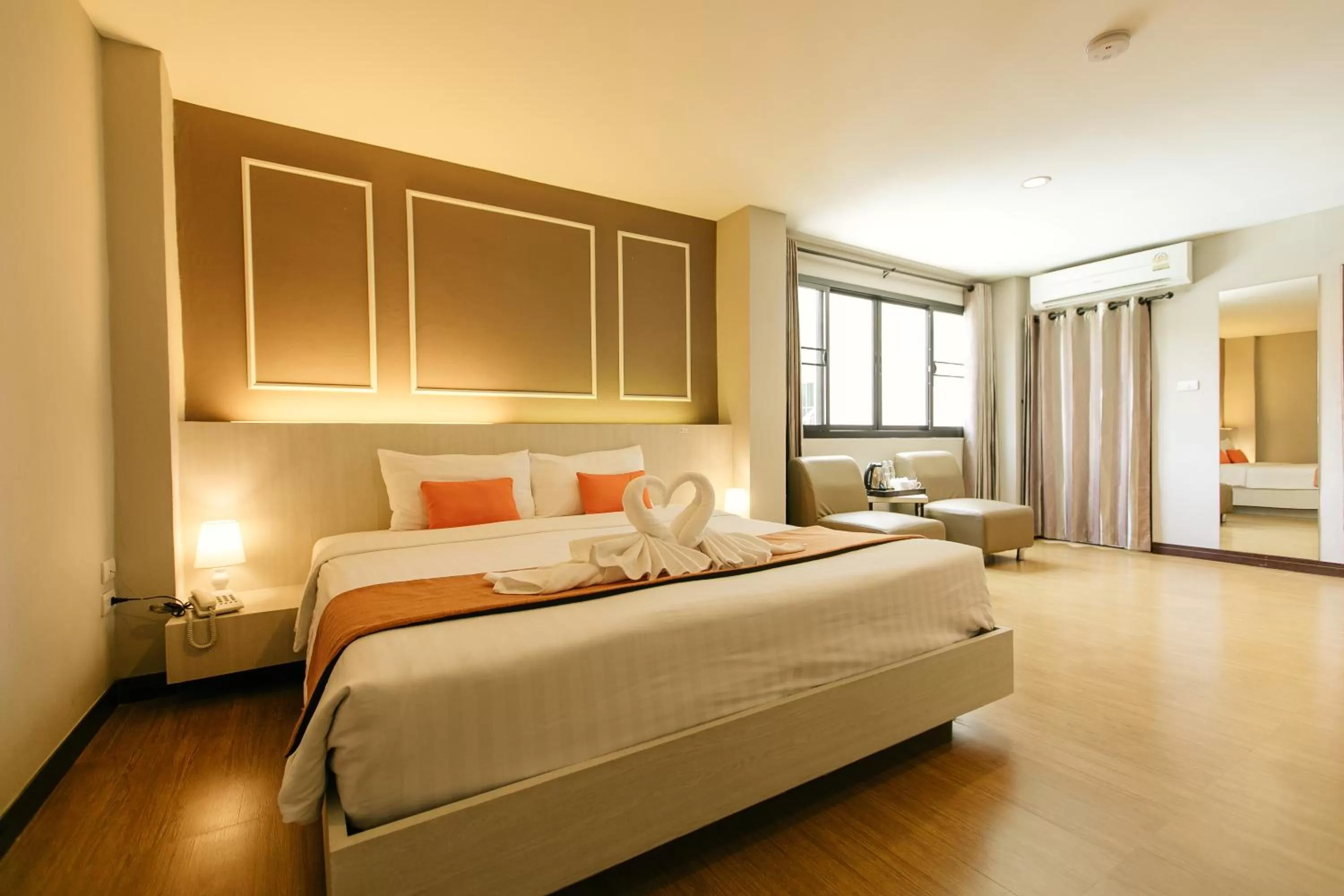 Bed in De Hug Hotel & Residence