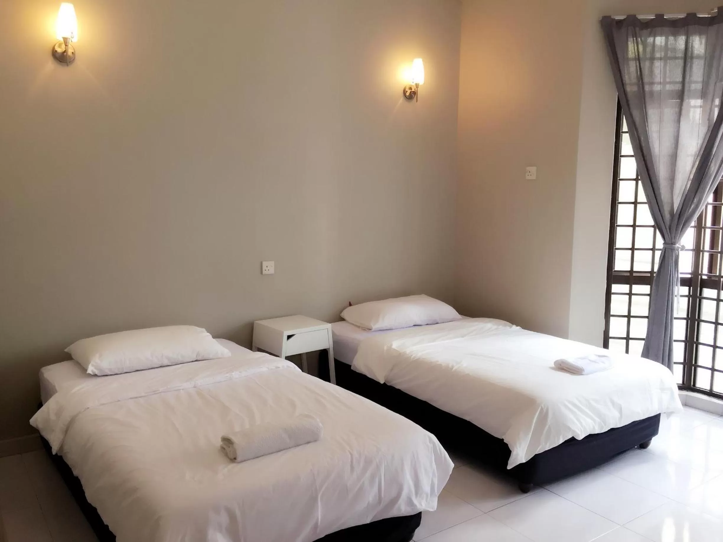 Photo of the whole room, Bed in Homestay Muar