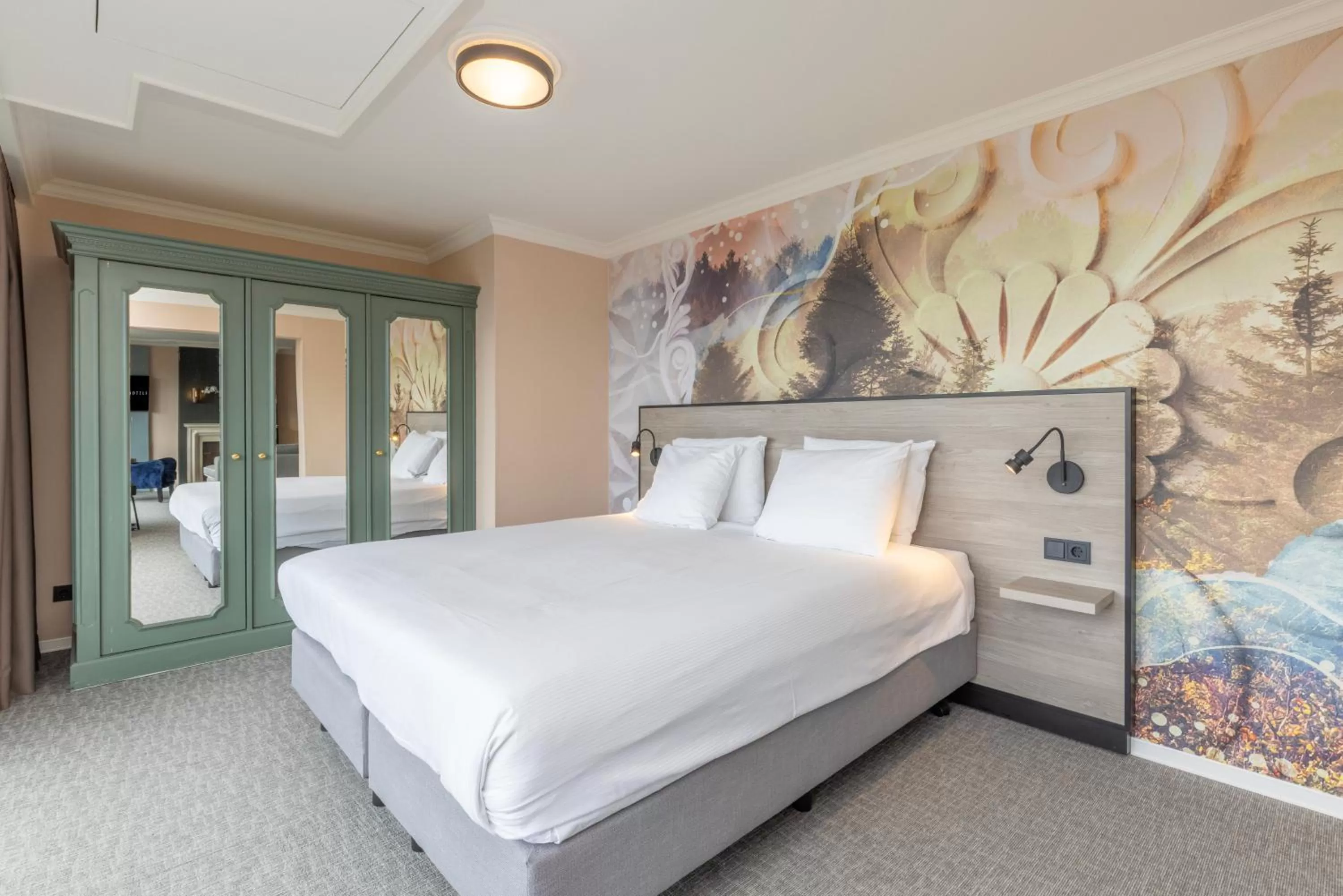 Bed in Fletcher Familiehotel De Hunzebergen