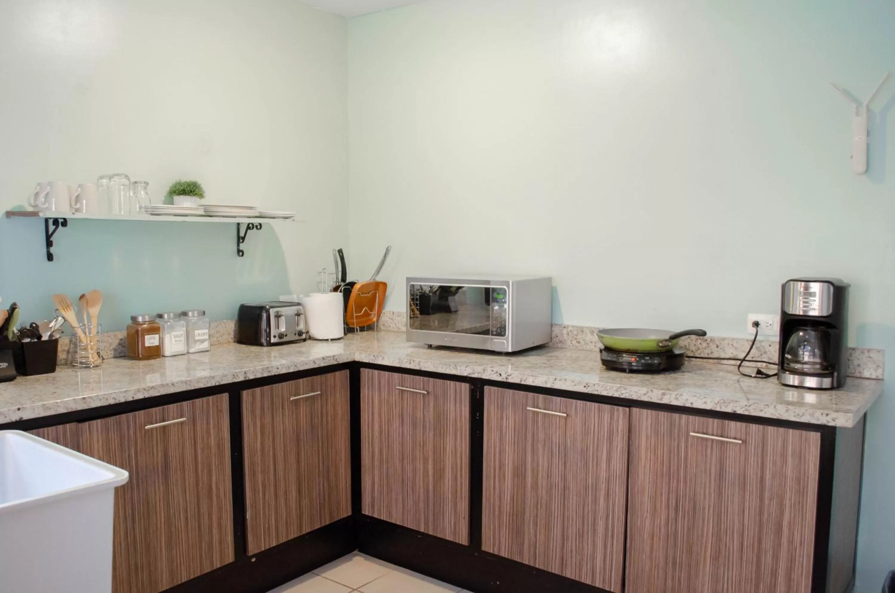 Communal kitchen in Pedregal Suites - Marina and Downtown
