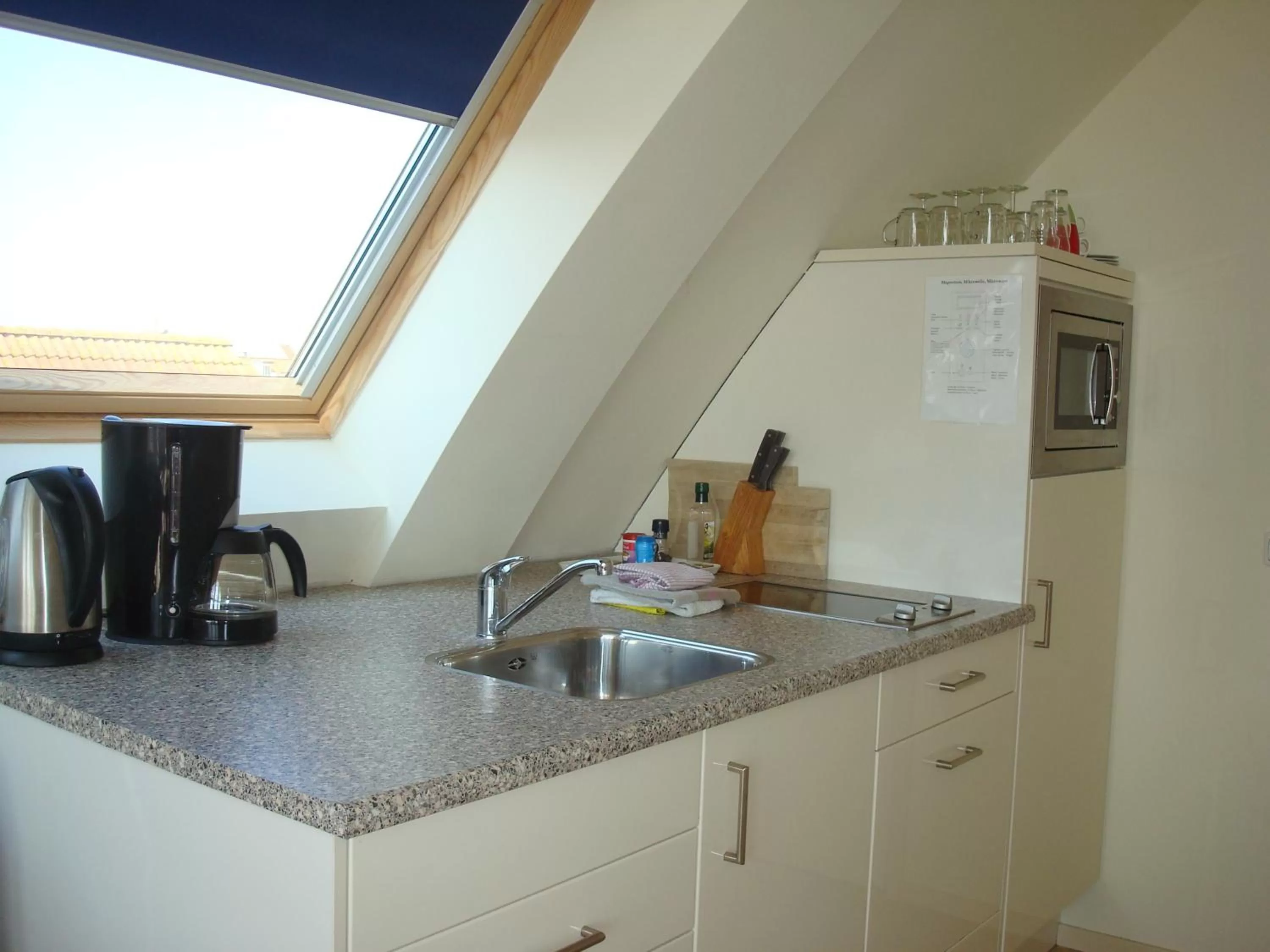 Kitchen or kitchenette in Hotel Rasch