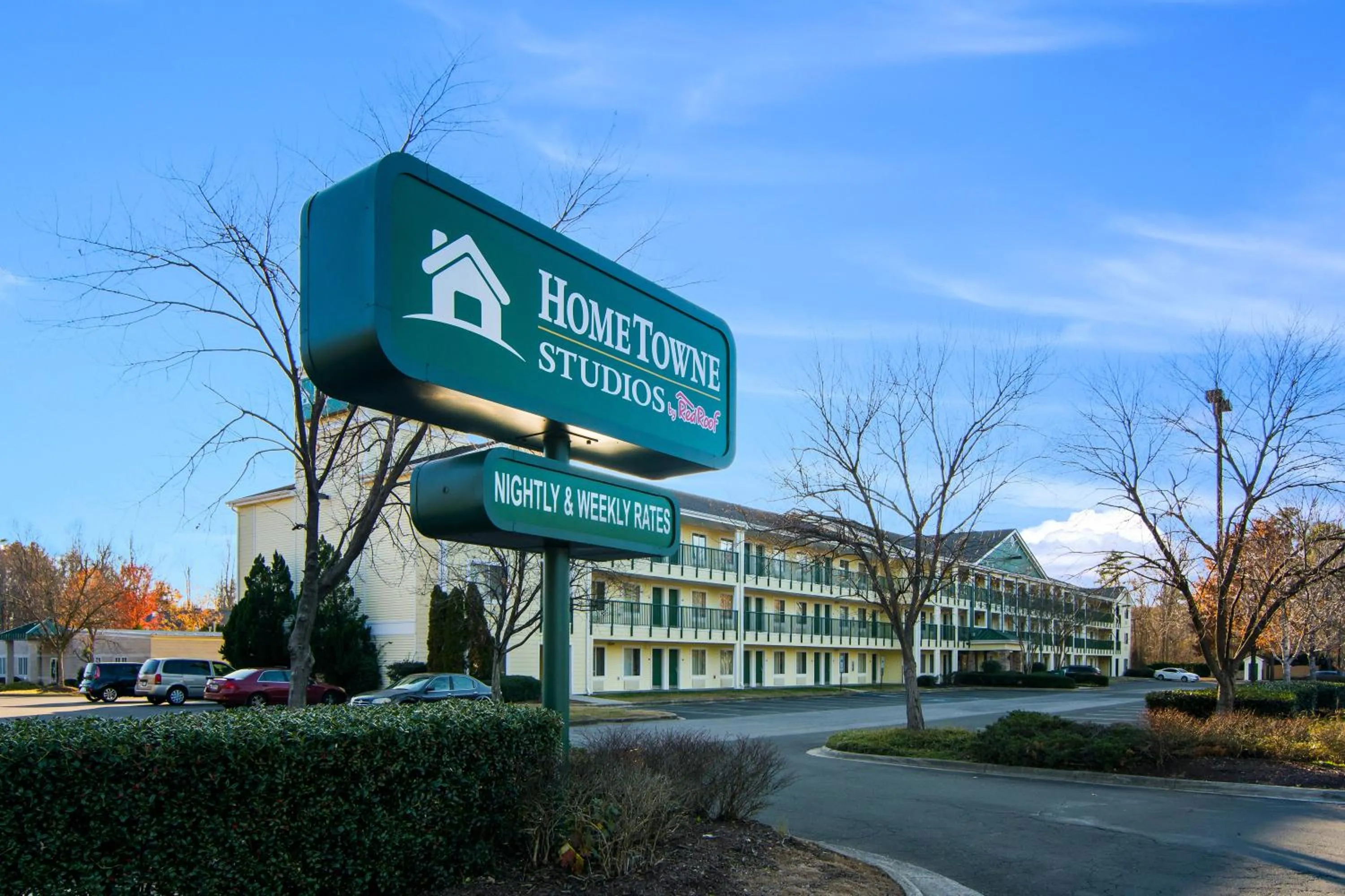 Property building in HomeTowne Studios by Red Roof Raleigh – Durham