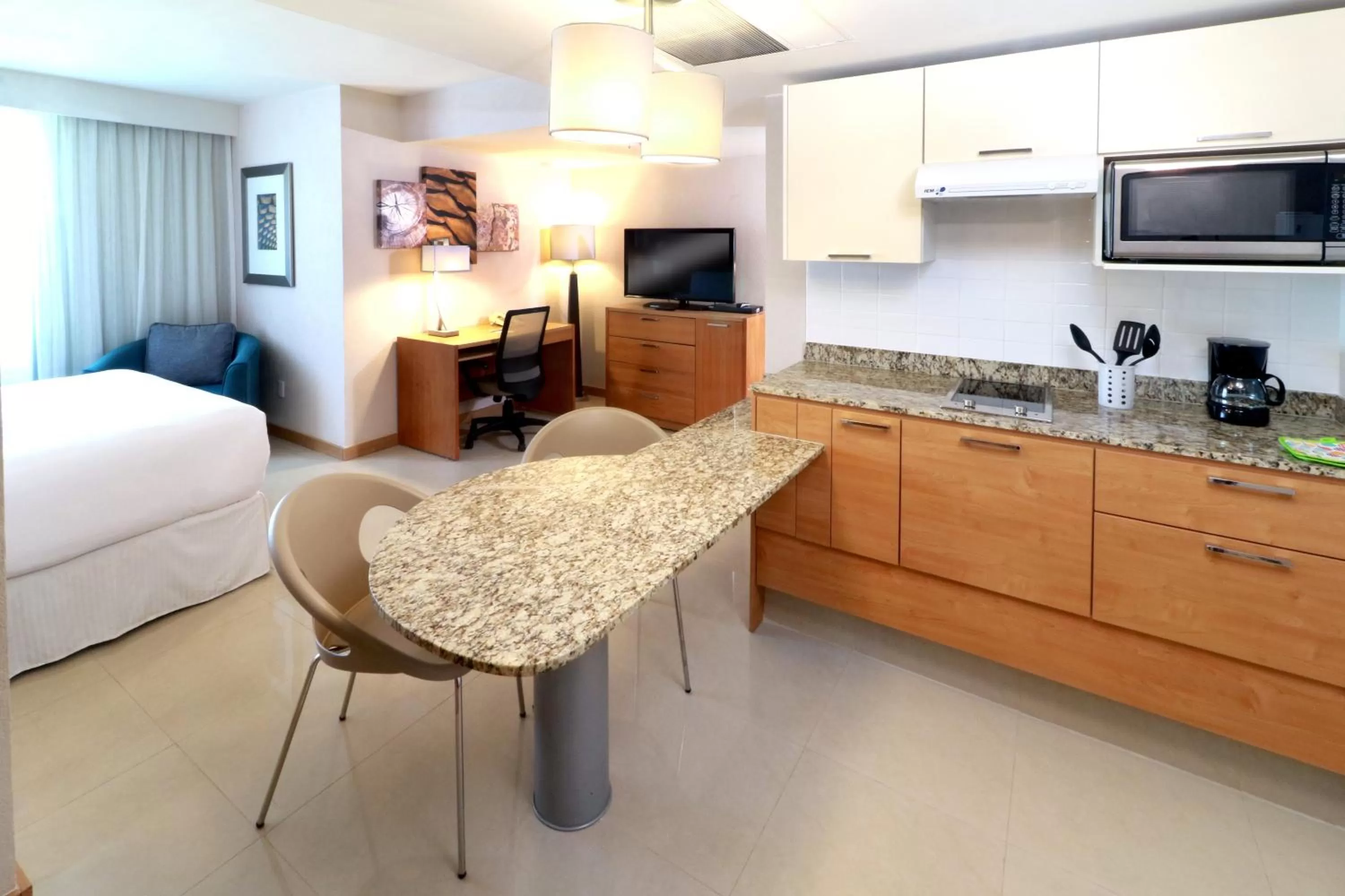 Photo of the whole room, Bed in Staybridge Suites Guadalajara Expo by IHG