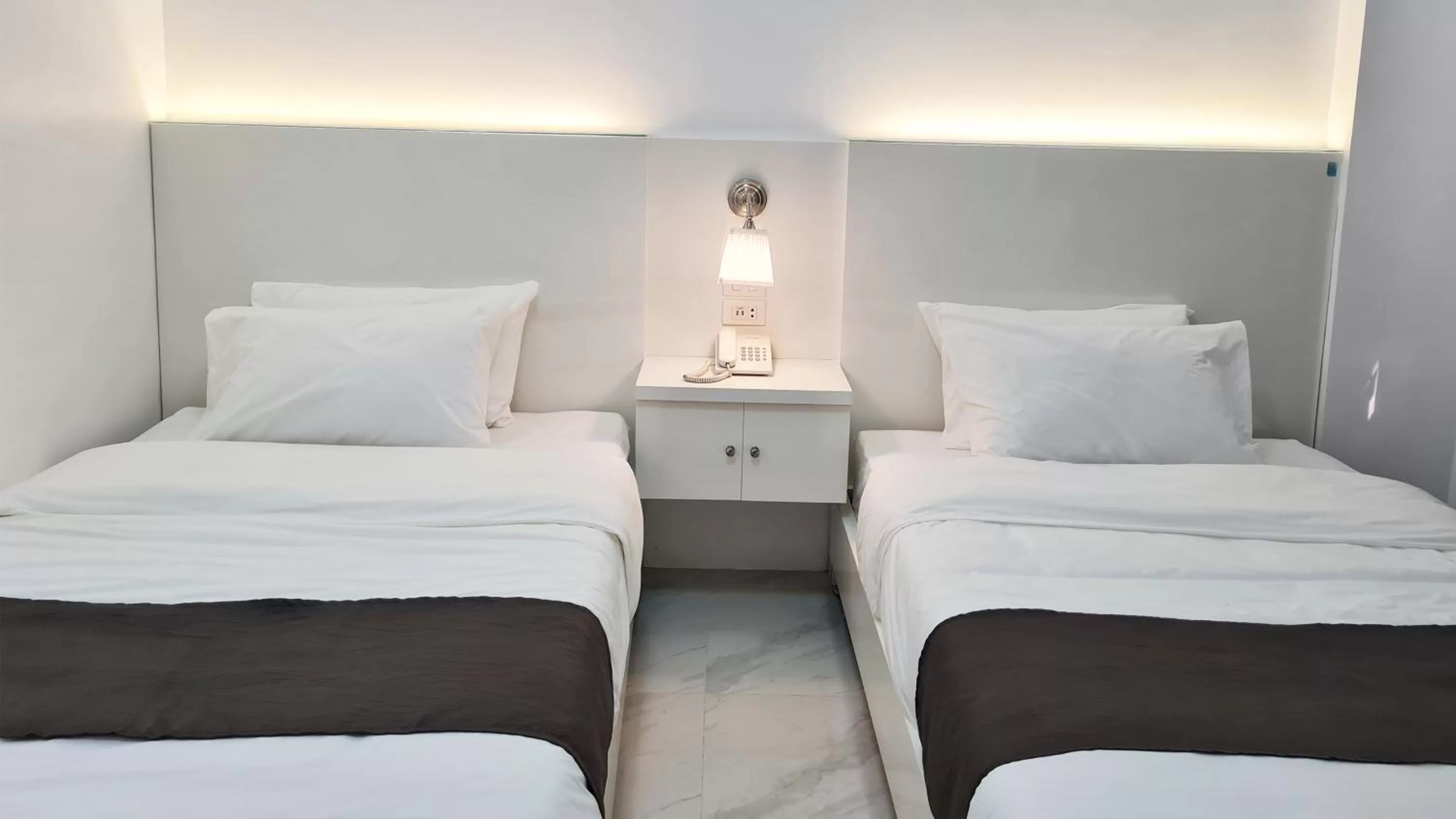 Bed in Staycation Hotel