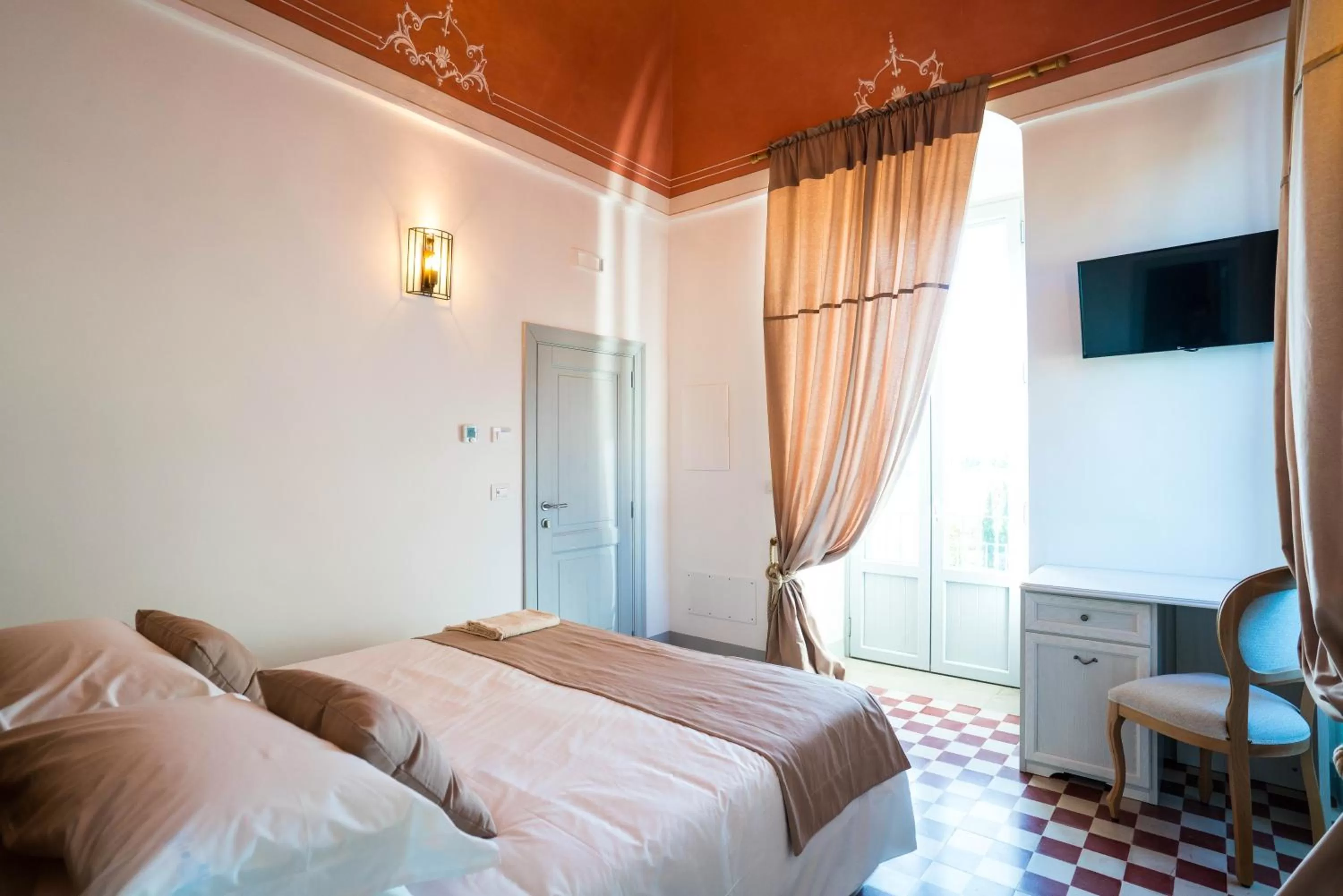 Communal lounge/ TV room, Bed in Borgo Cozzana