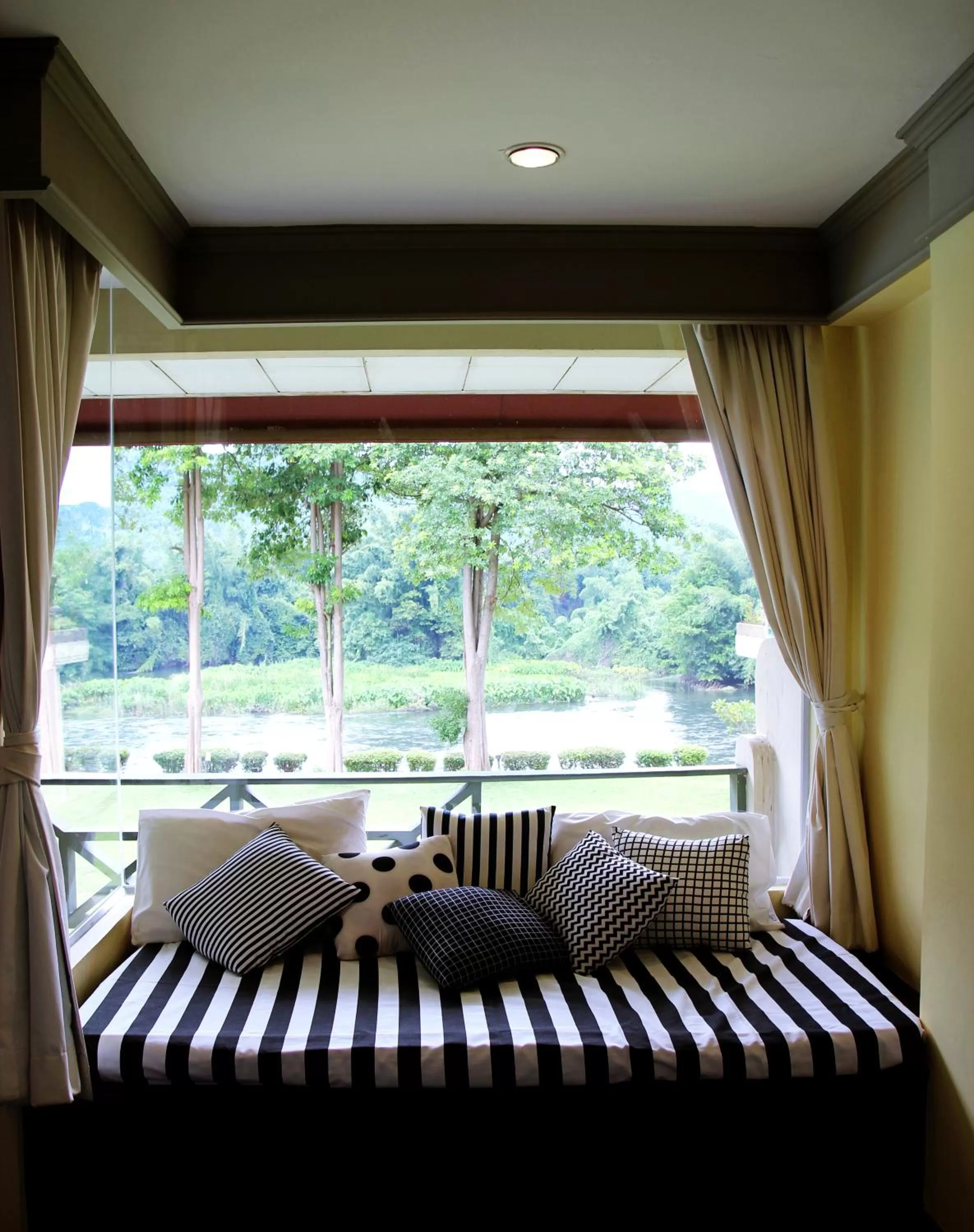 Decorative detail, Bed in Aekpailin River Kwai Resort