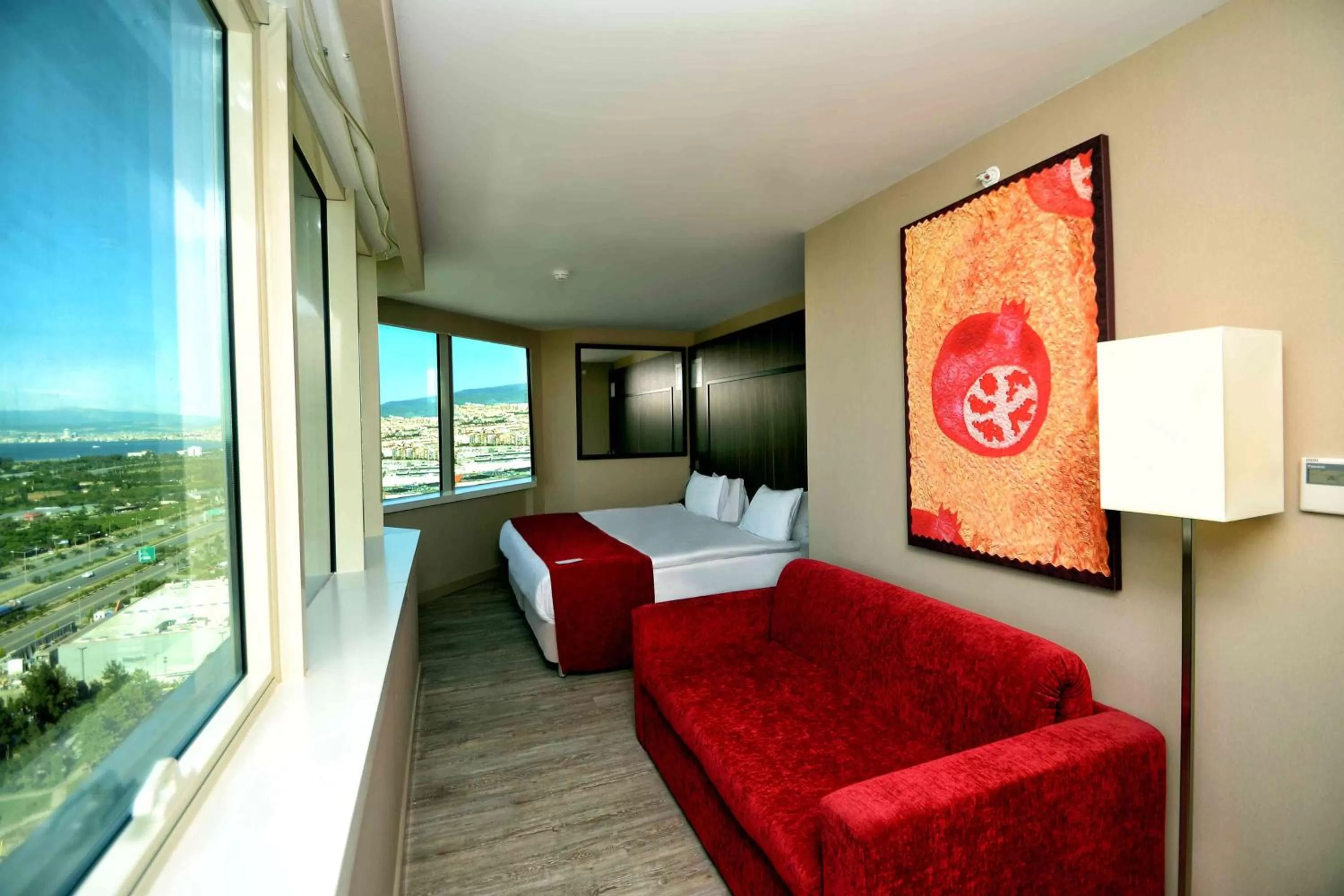 Photo of the whole room, Bed in Ramada Encore by Wyndham Izmir