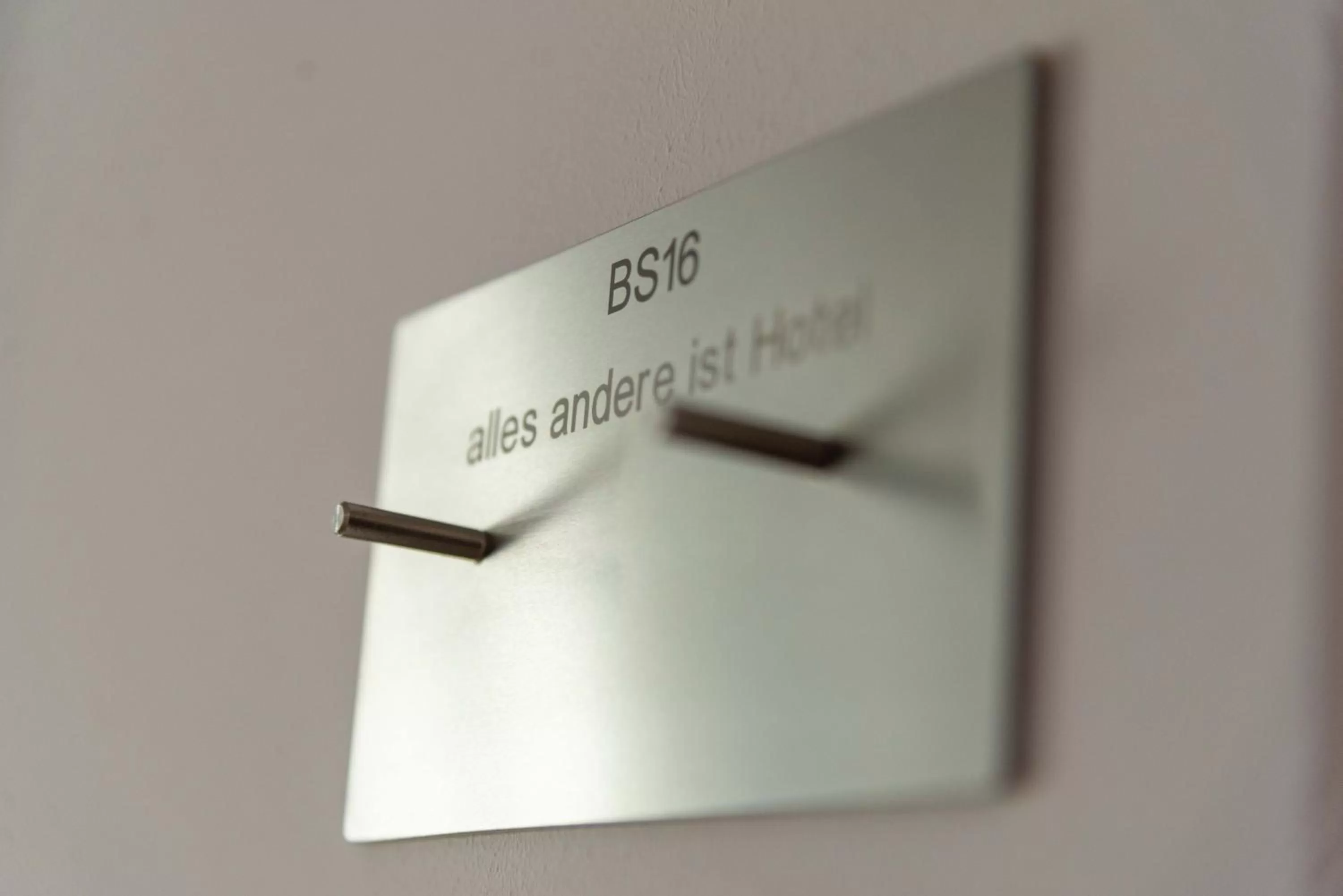 Logo/Certificate/Sign in Boutique Hotel BS16 before Bern City Parking gratis
