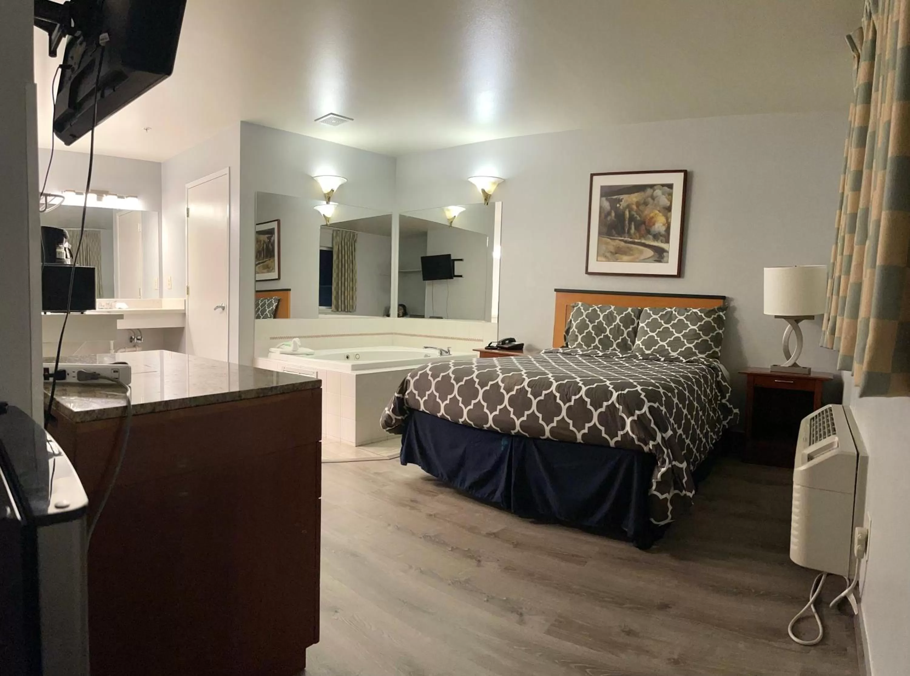 Bedroom, Bed in Americas Inn & Suite