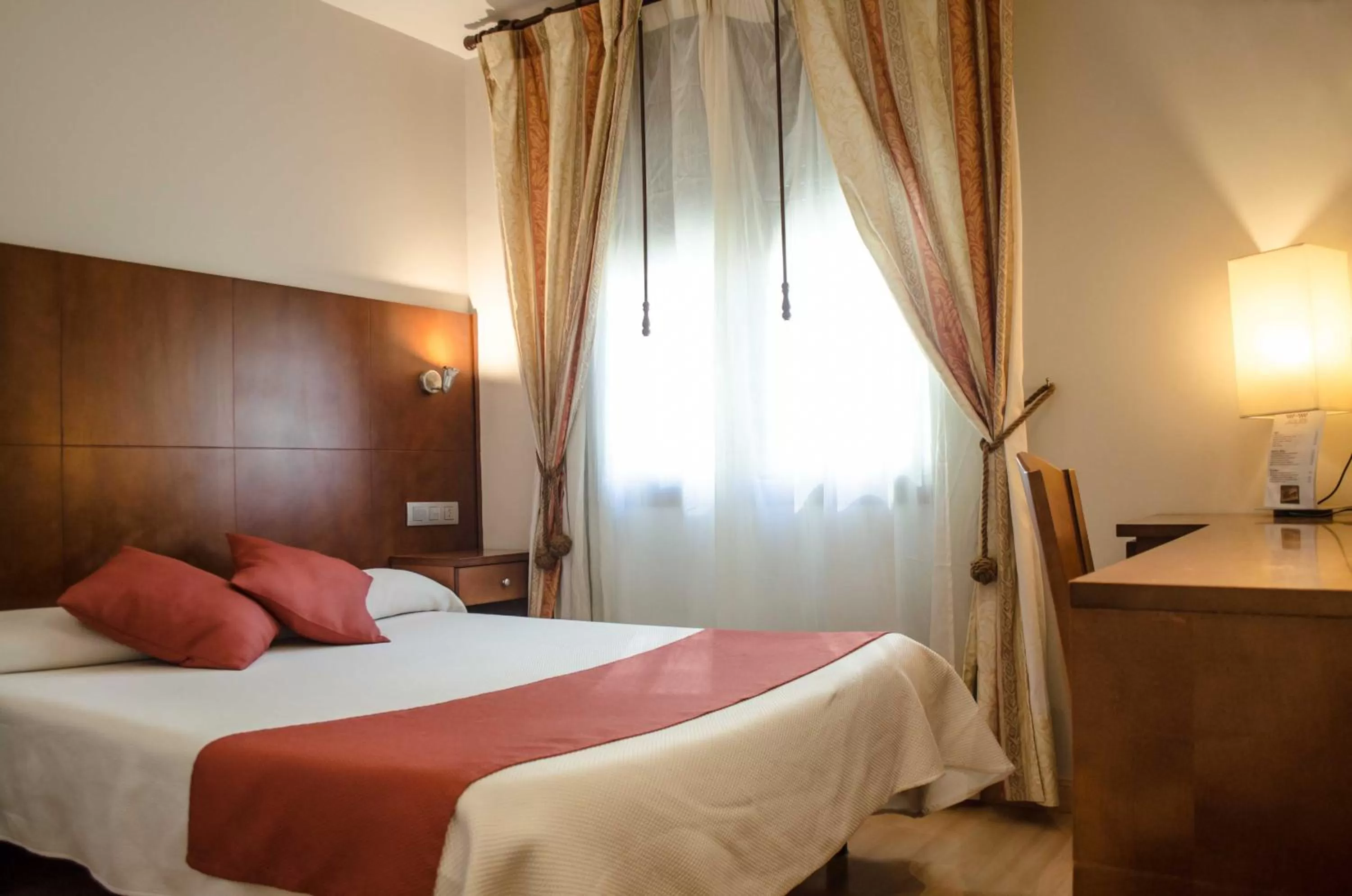 Bed in Hotel Jaqués