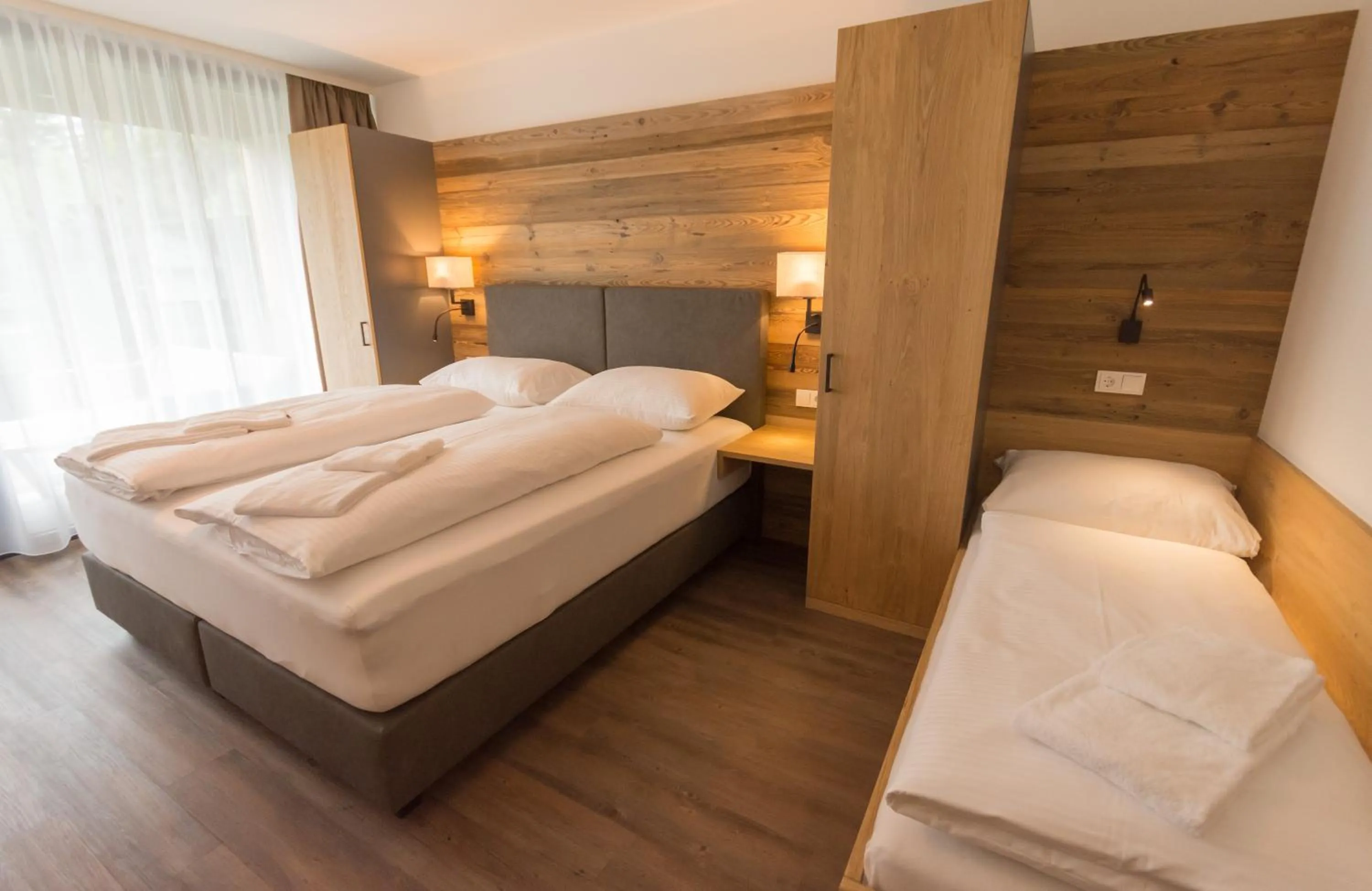 Bedroom, Bed in Schönblick Residence - Absolut Alpine Apartments