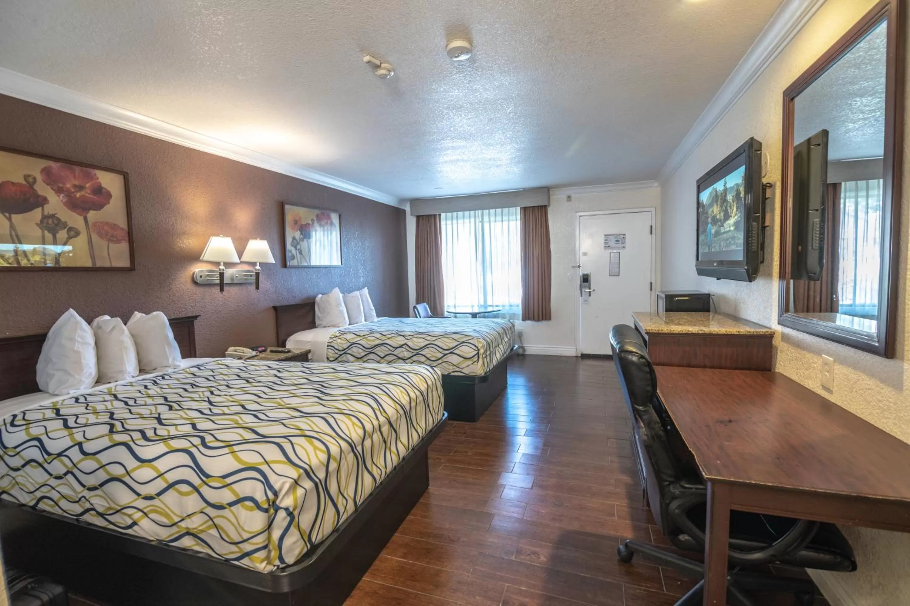 Bed in Hospitality Inn