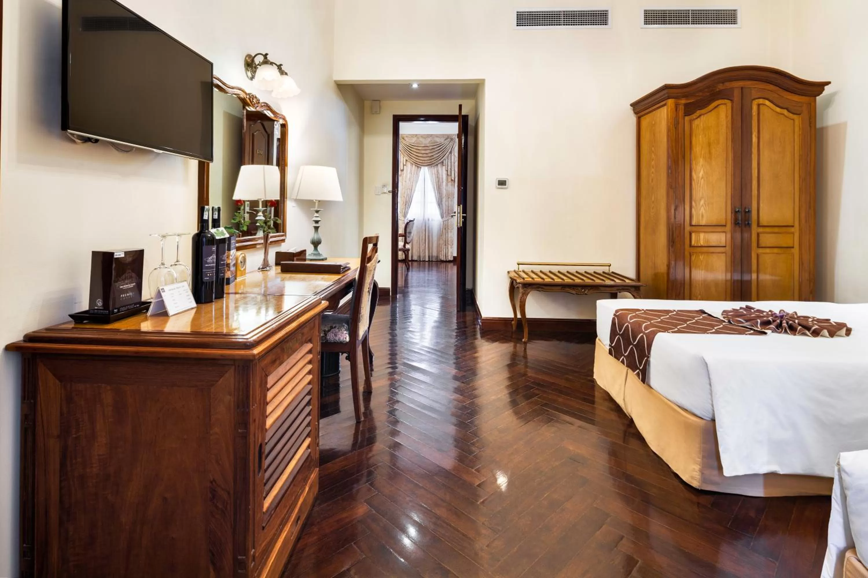 Photo of the whole room, Bed in Hotel Grand Saigon