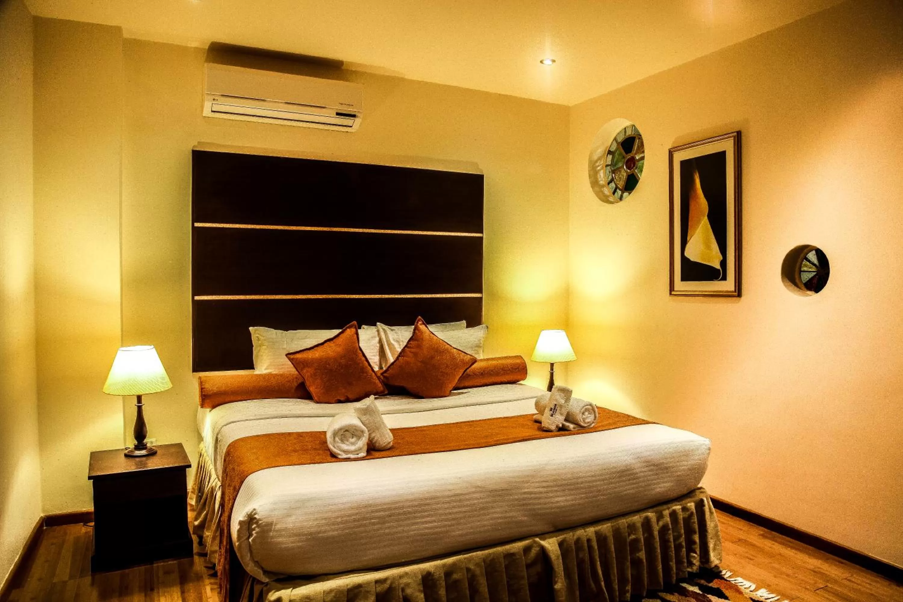 Bedroom in The Monarch Hotel