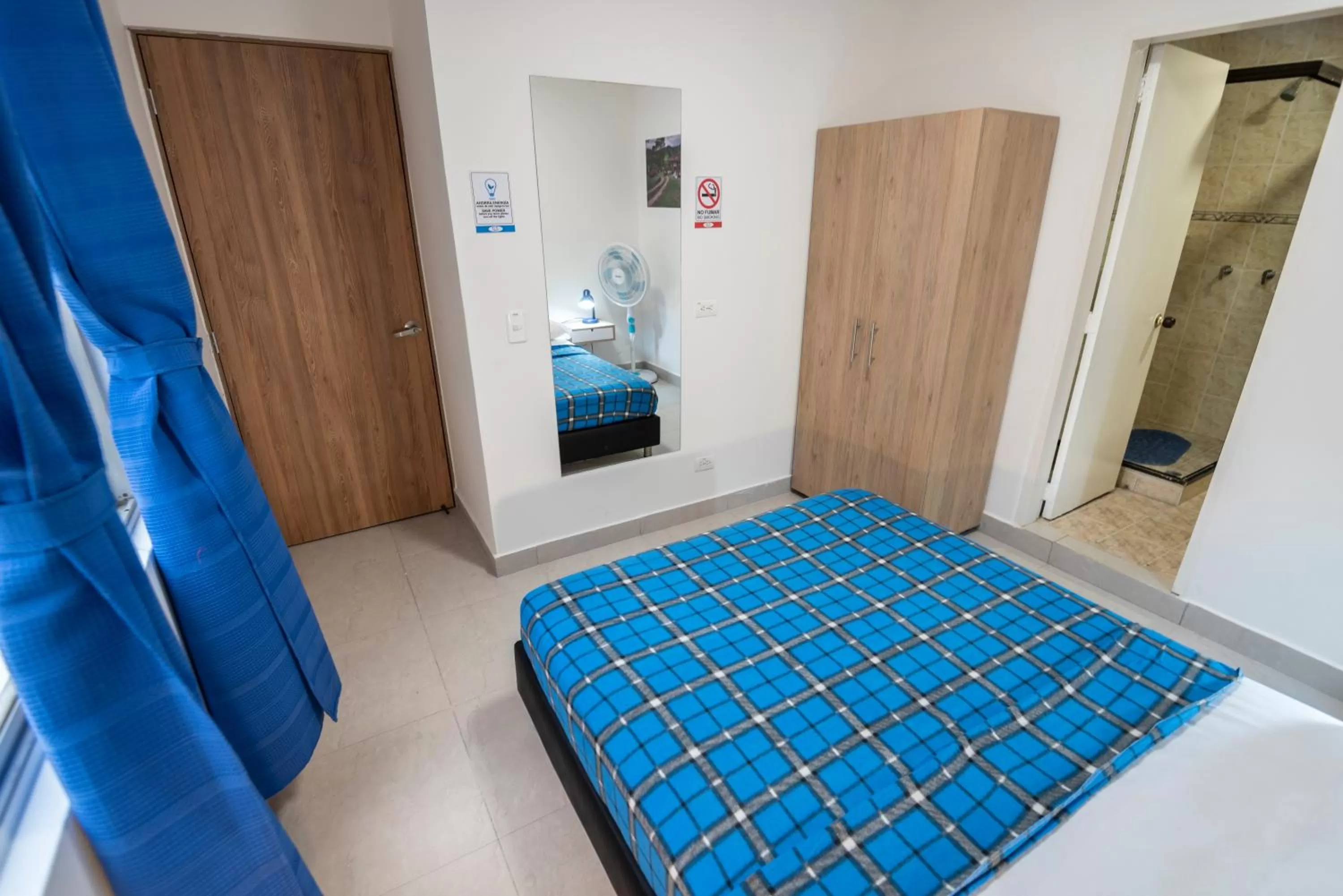 Photo of the whole room, Bed in Air Guest House