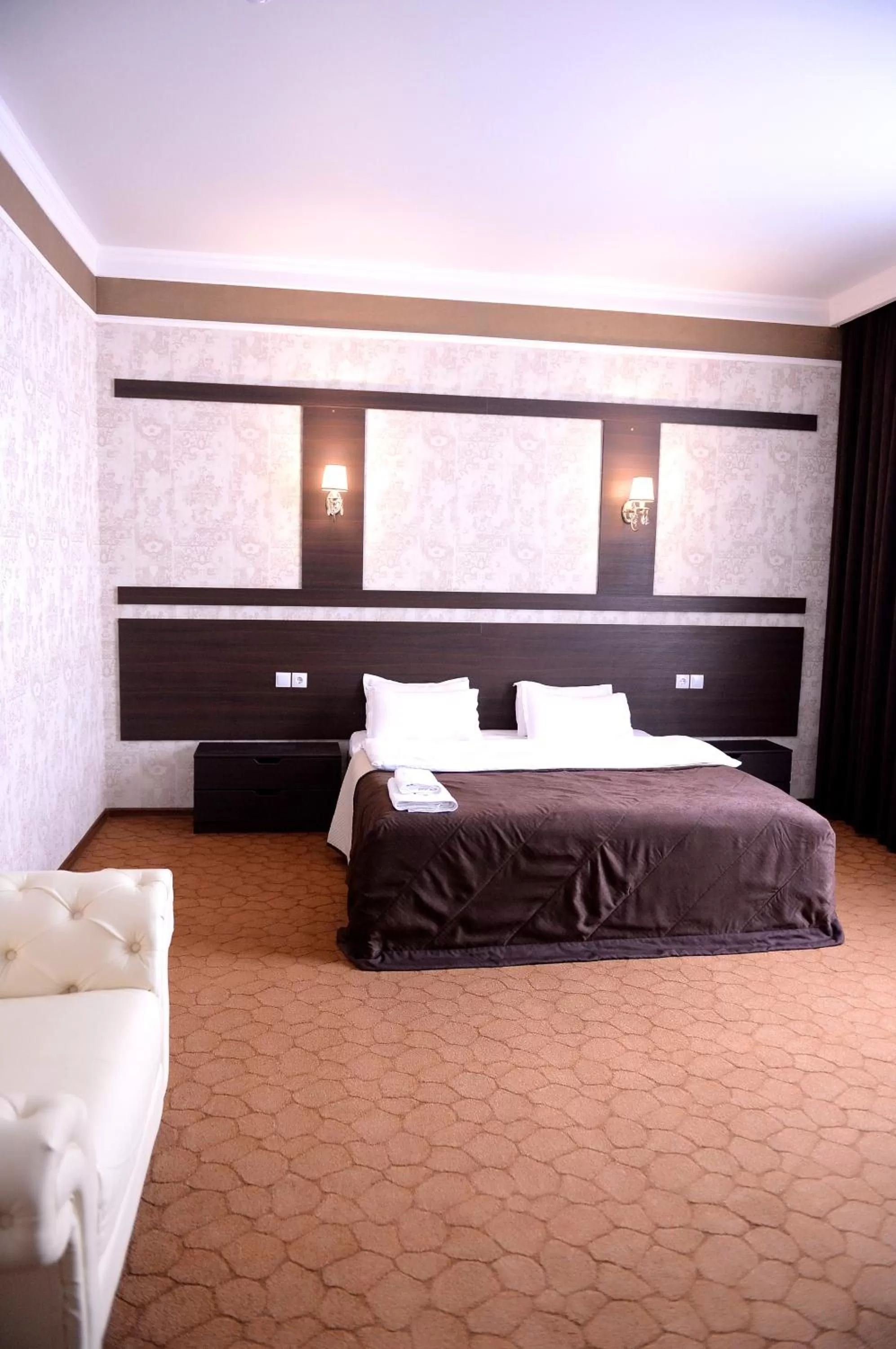 Bed in Pride Hotel