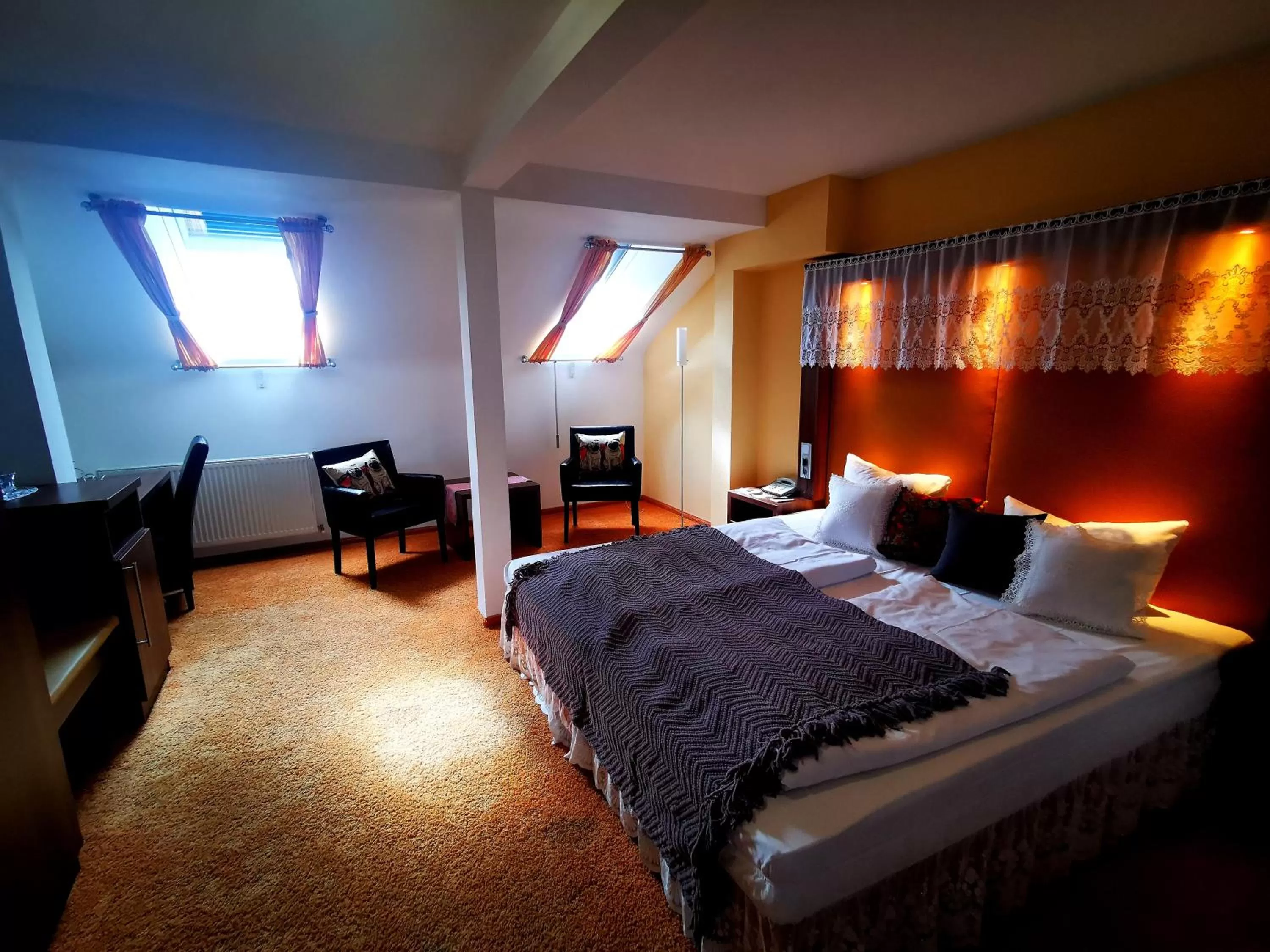 Bed in Tante ALMA's Mannheimer Hotel