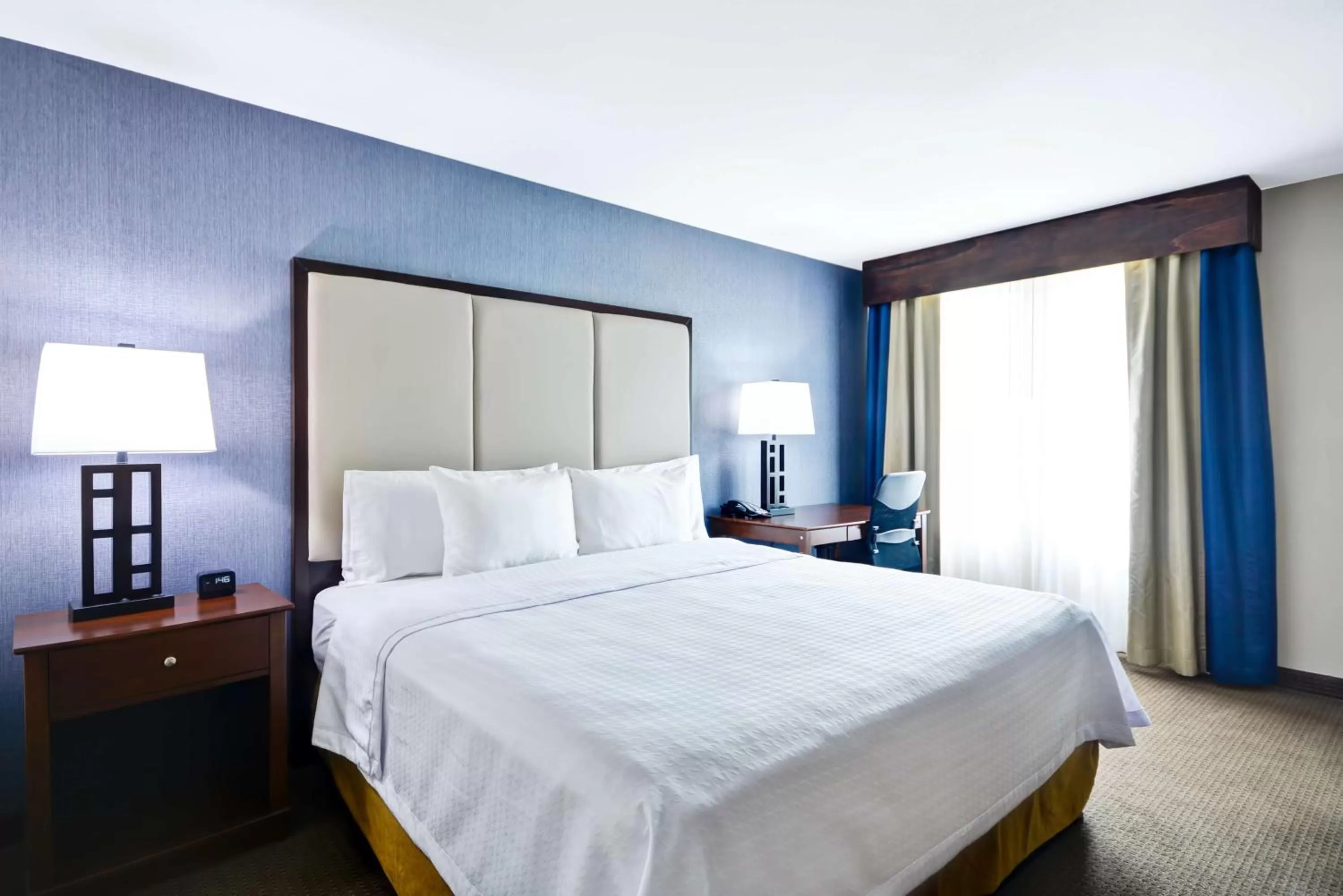 Bed in Homewood Suites by Hilton Dallas-Lewisville