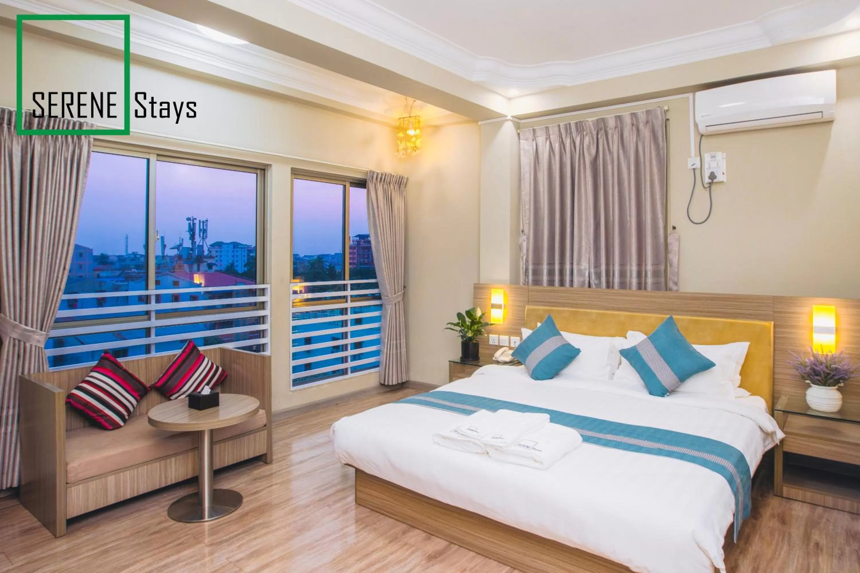 Photo of the whole room, Bed in SERENE Stays Hotel