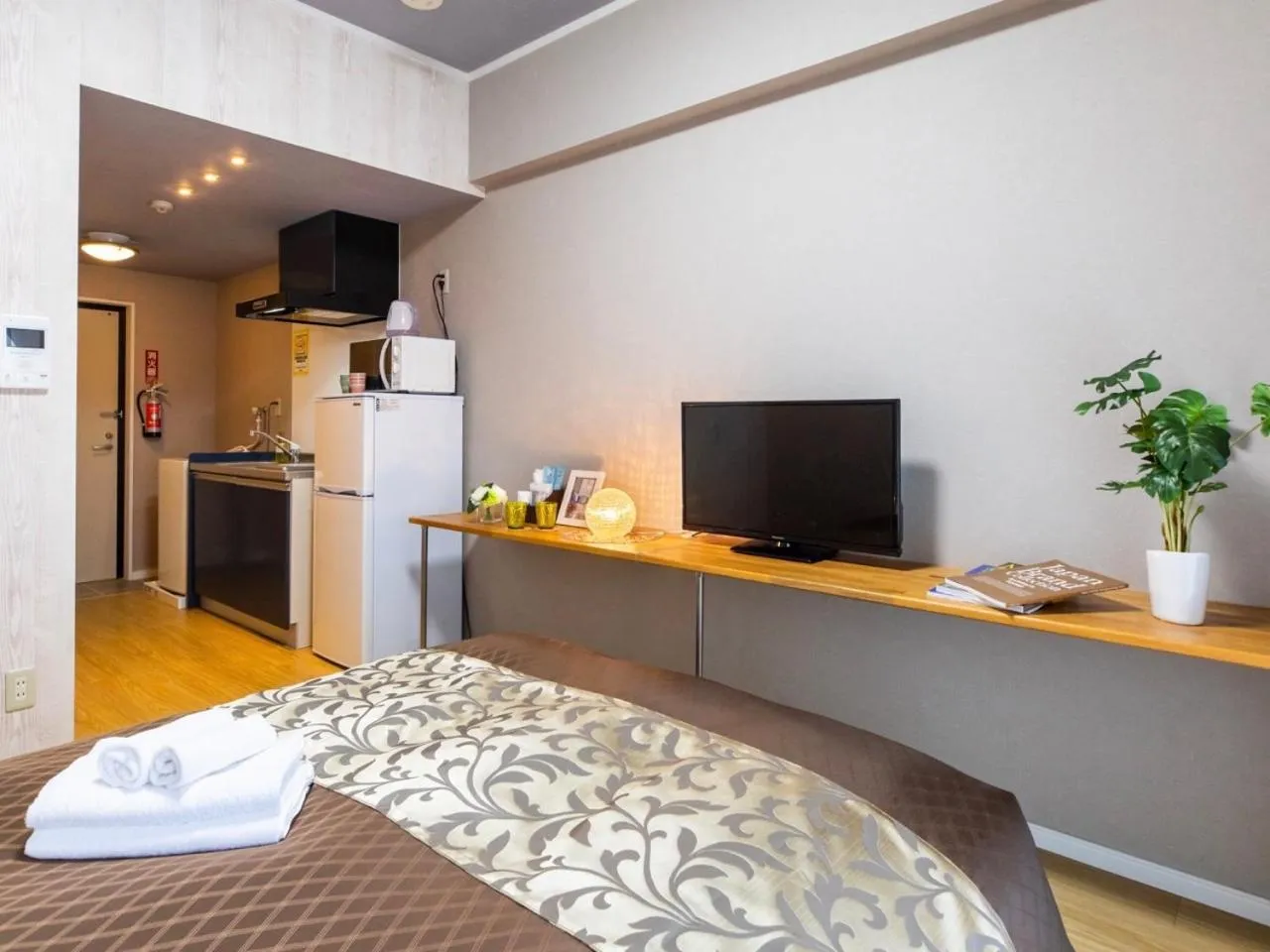 TV/Entertainment Center in Mr. Kinjo in ASATO