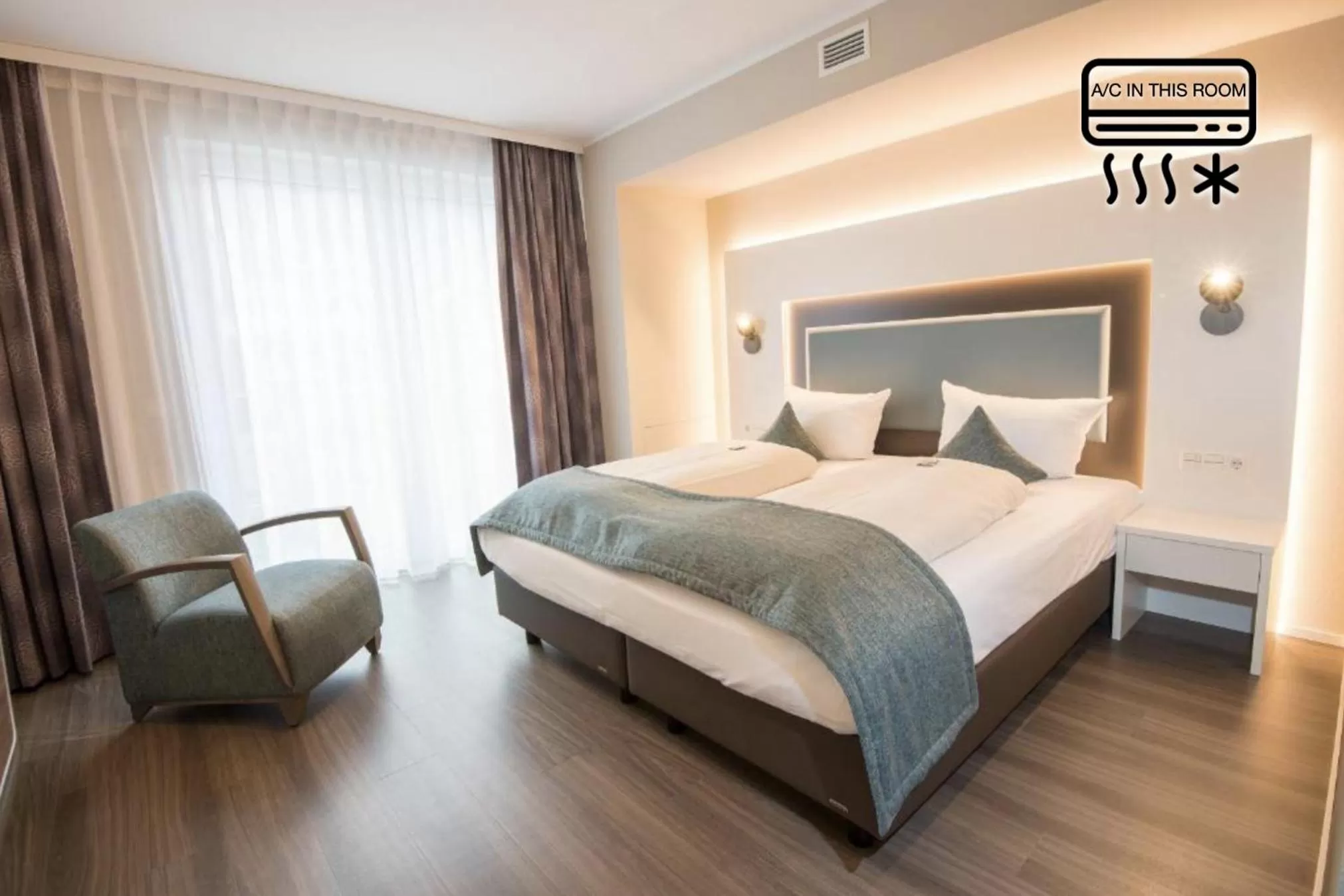 Photo of the whole room, Bed in Stadthotel Freiburg Kolping Hotels & Resorts