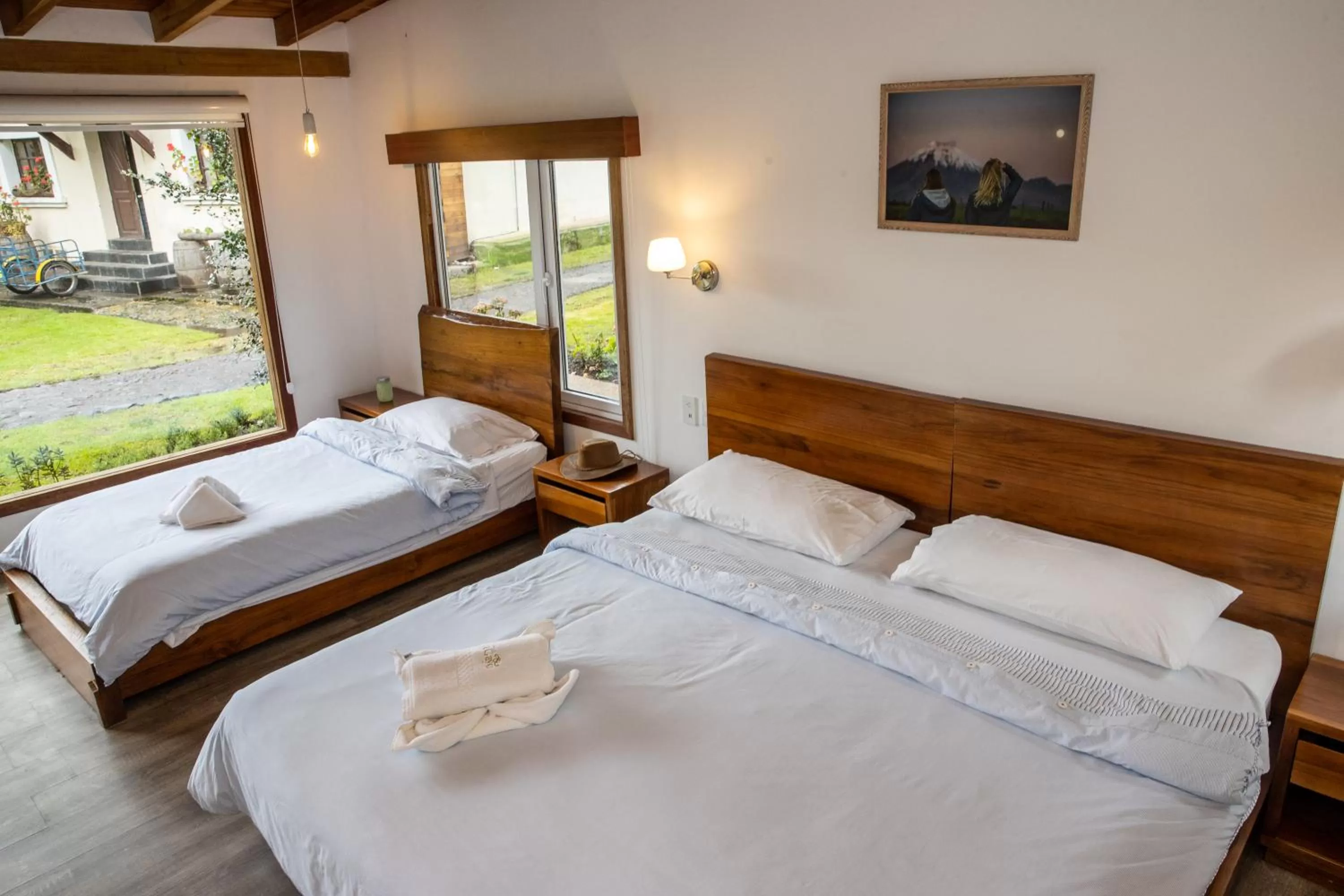 Bed in Hosteria Papagayo Cotopaxi