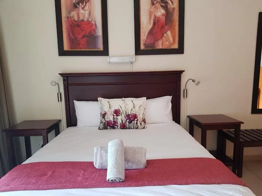 Bed in Mzingeli Guesthouse