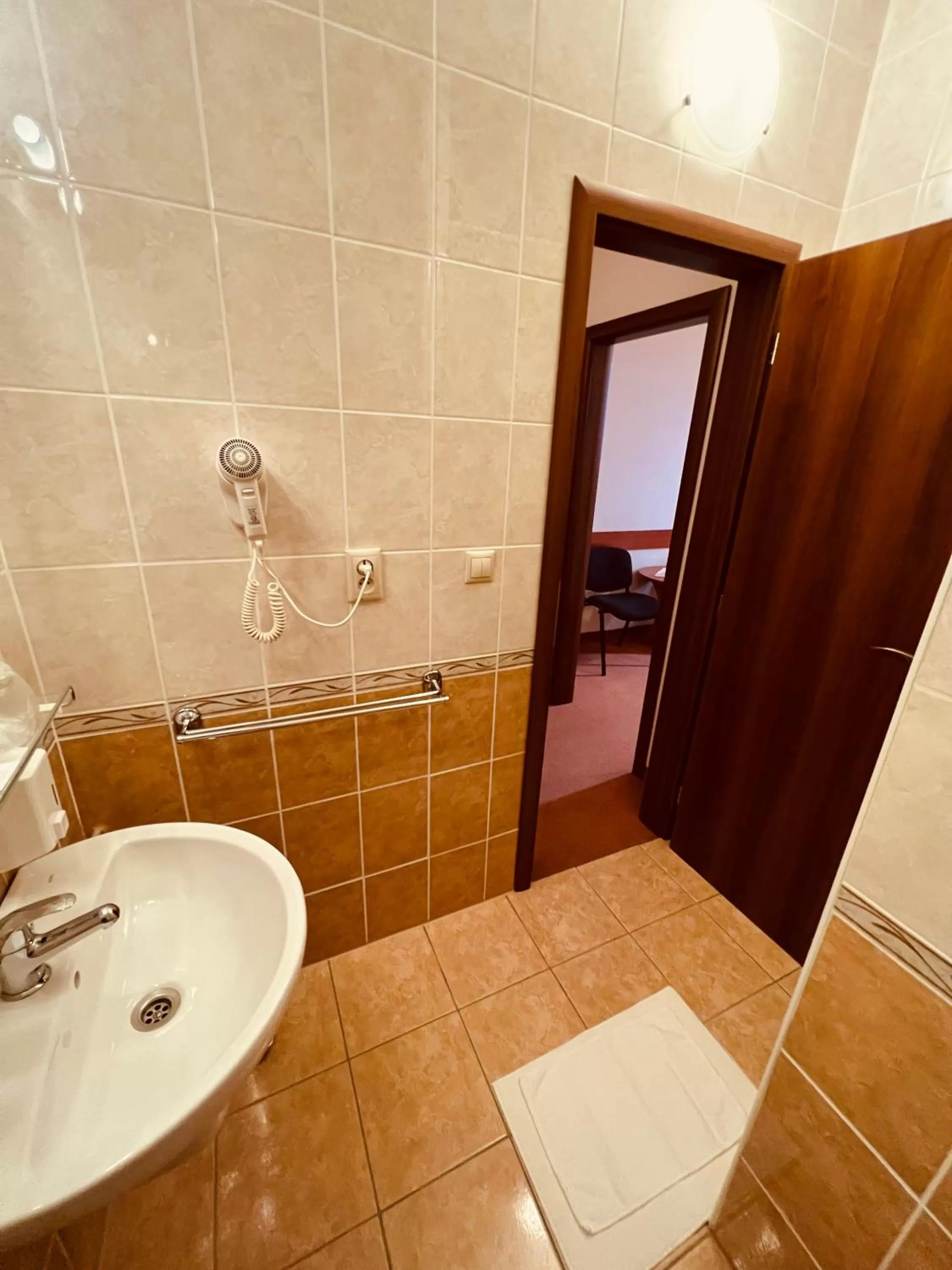 Bathroom in Spa & Wellness Hotel Orchidea