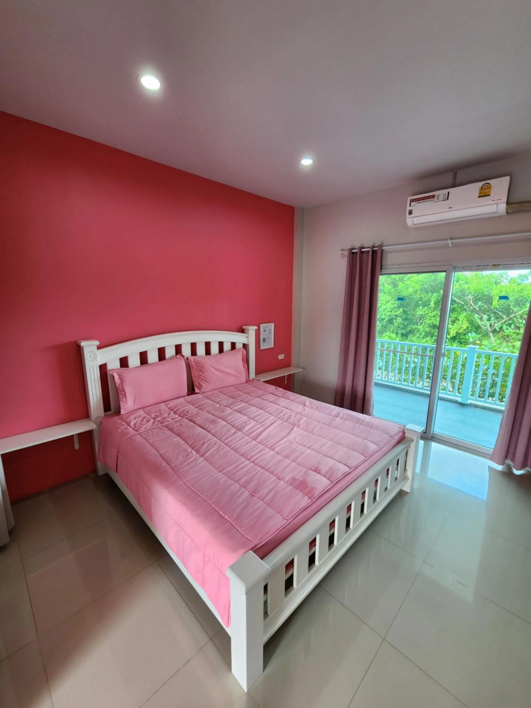 Bed in Vanilla Ville Resort