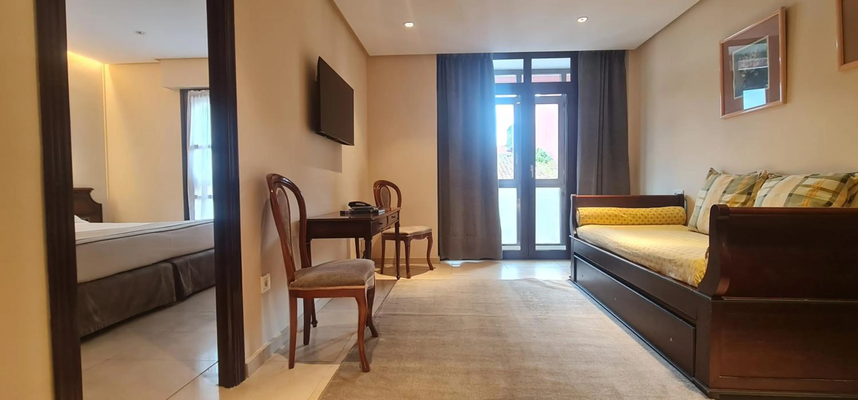 Living room, Bed in Gran Hotel Paraiso