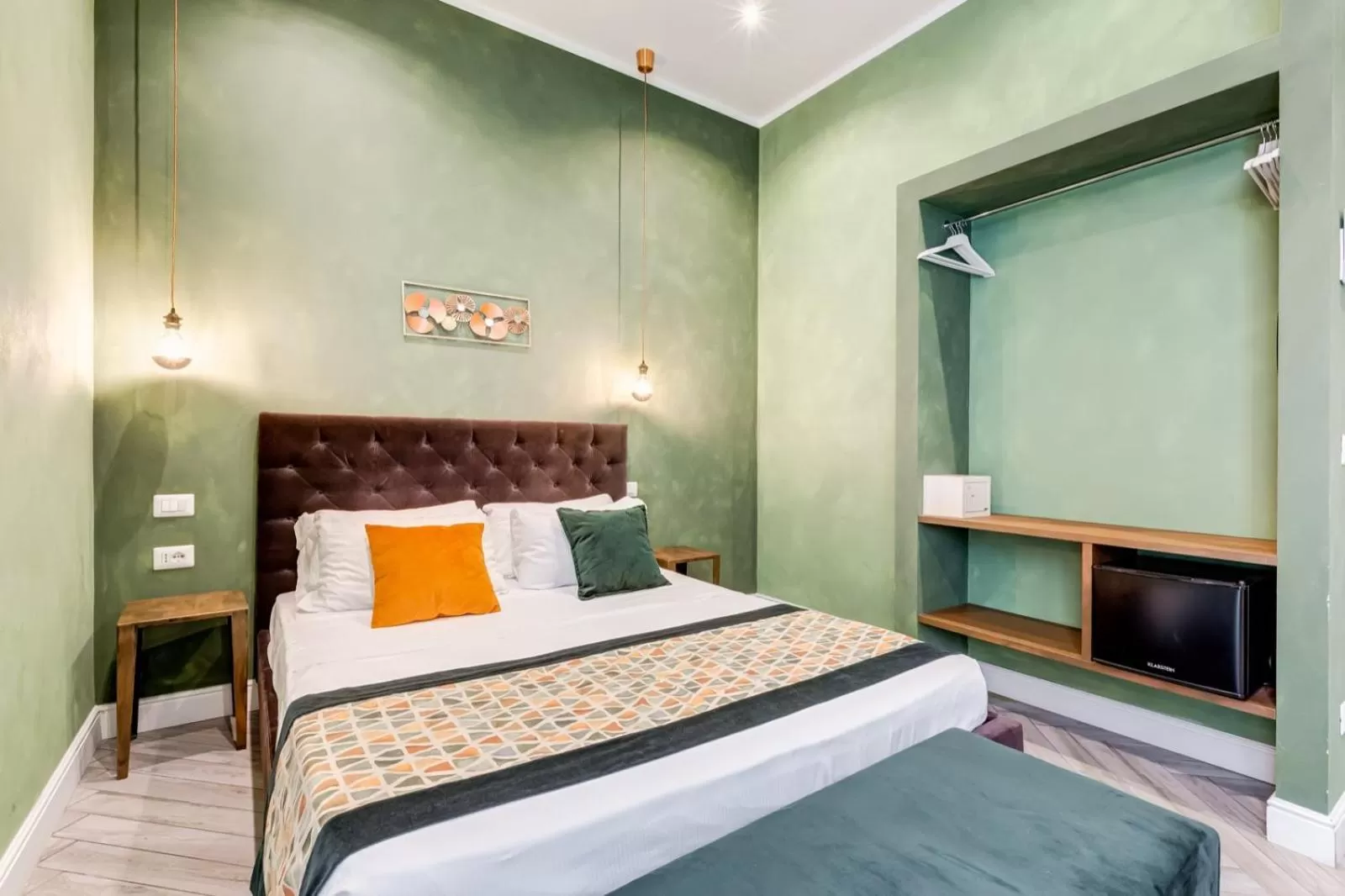 Bed in Ripetta Deluxe Suites