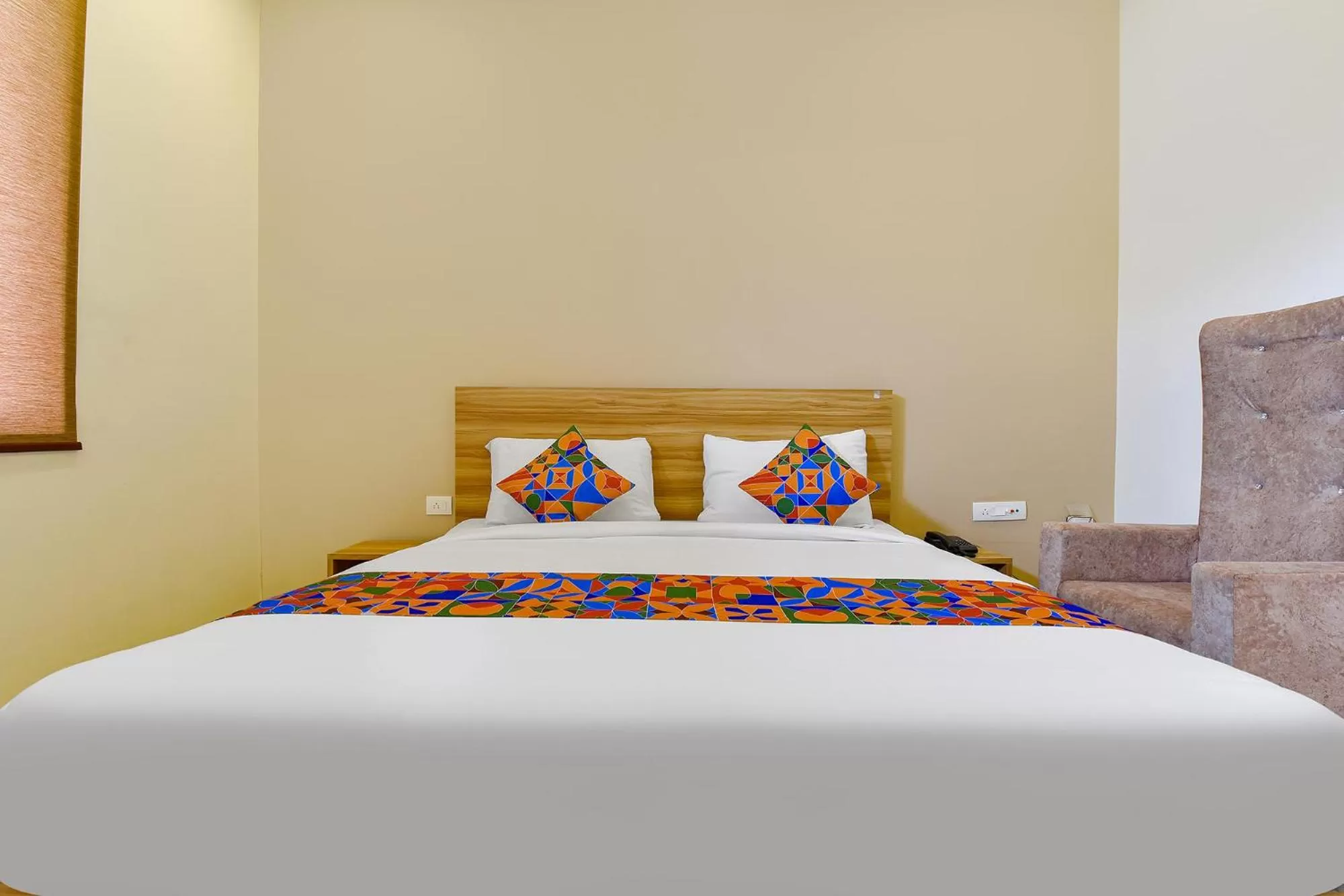 Bed in FabHotel Prime Oxus