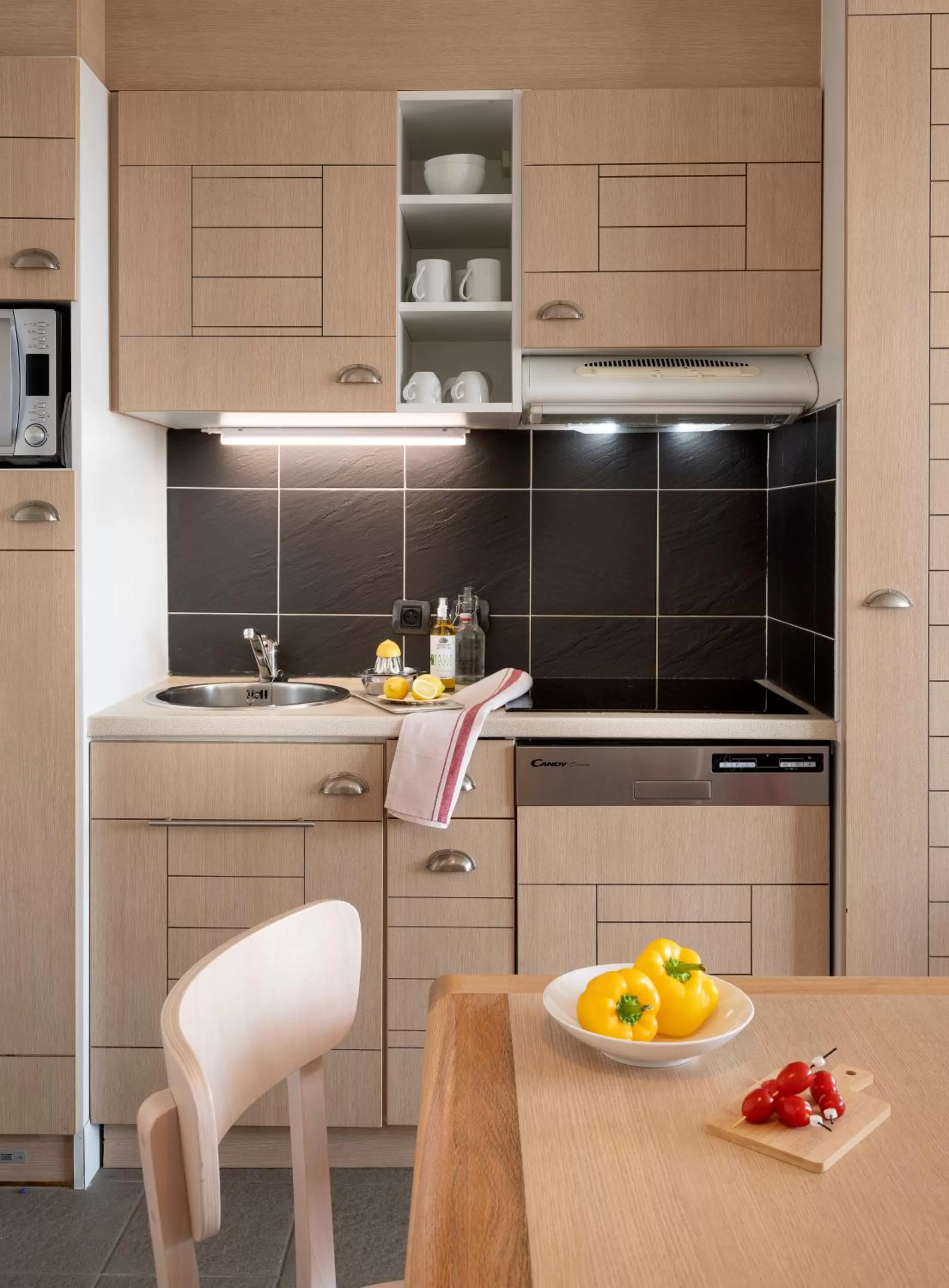 Kitchen or kitchenette in Pierre & Vacances Premium Résidence de la Plage