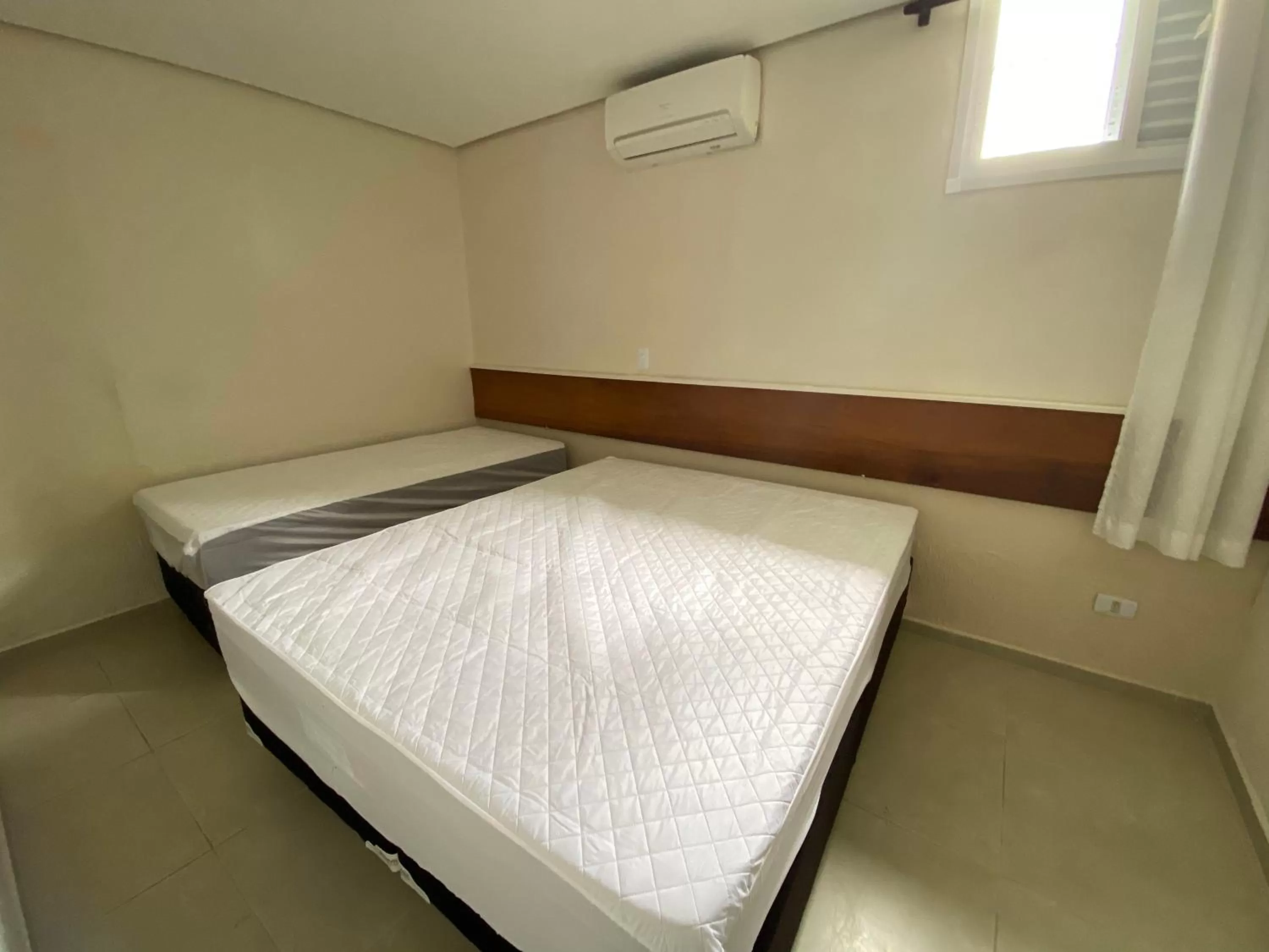 Bed in Green Haven Residence