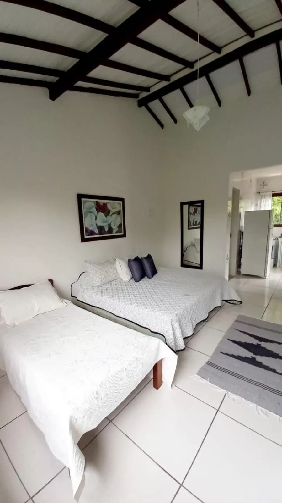 Bed in Pousada Recanto Das Emerências