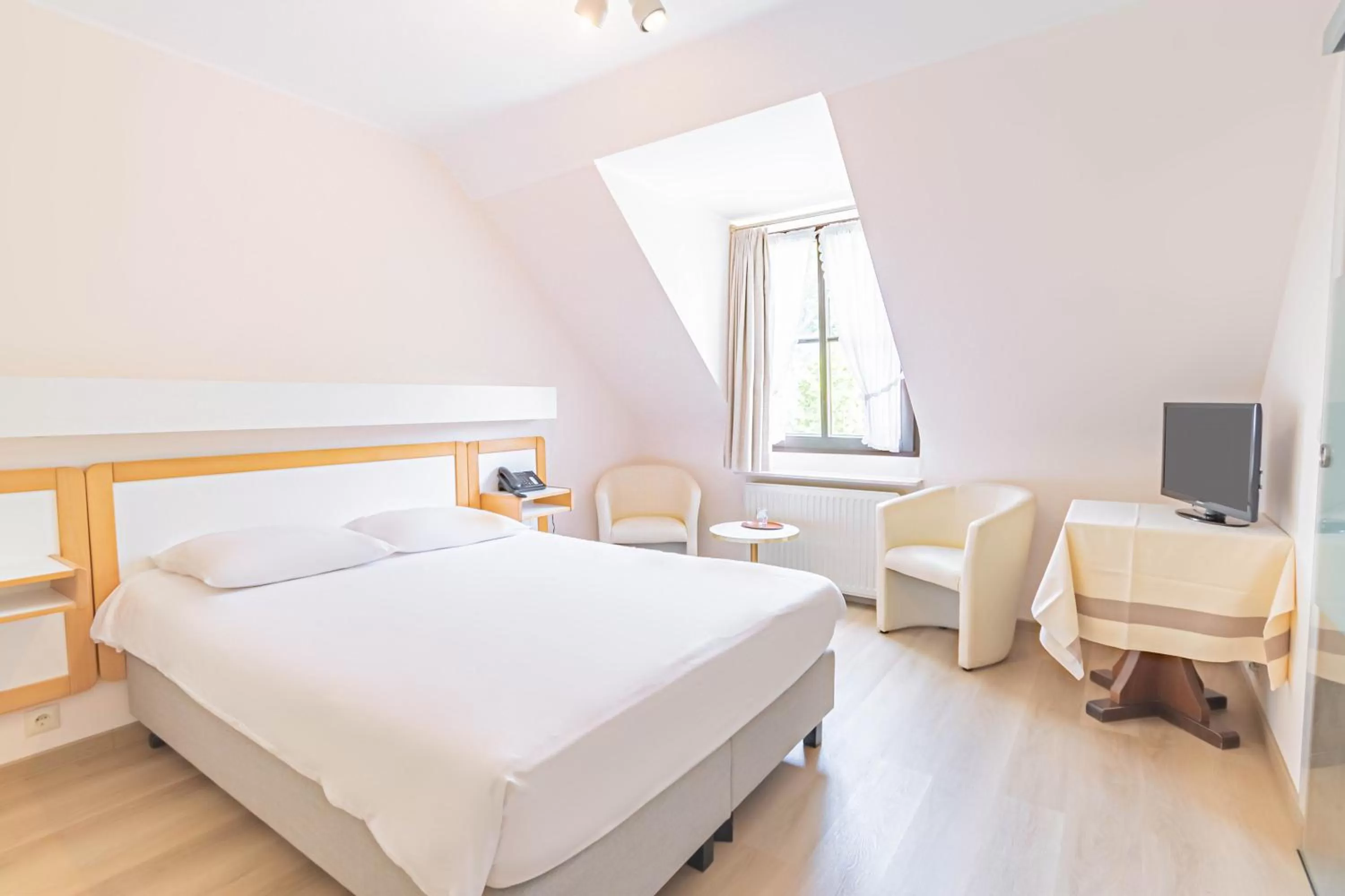 Bed in Hotel Le Postillon