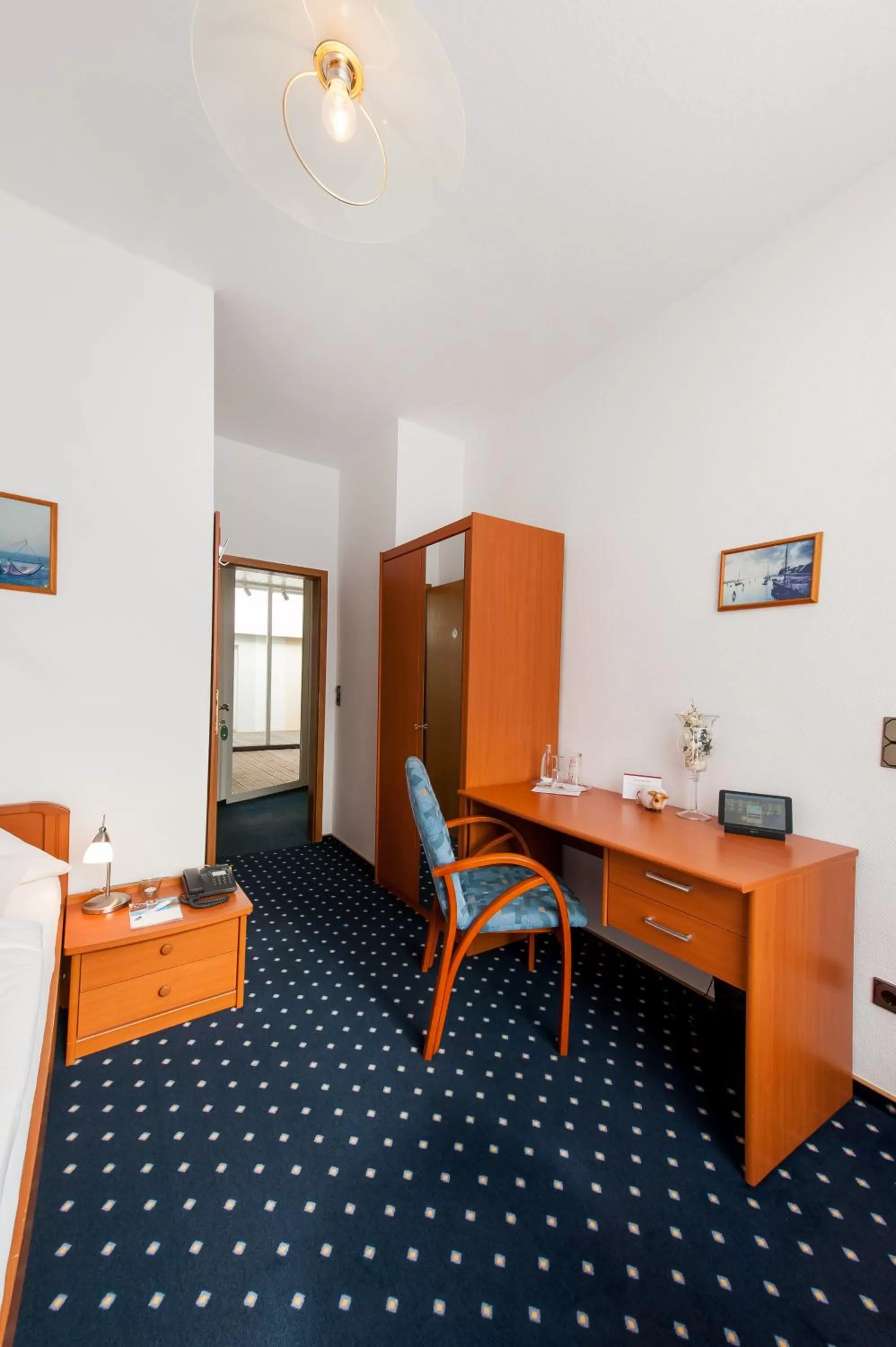 Photo of the whole room in Landhotel Butjadinger Tor