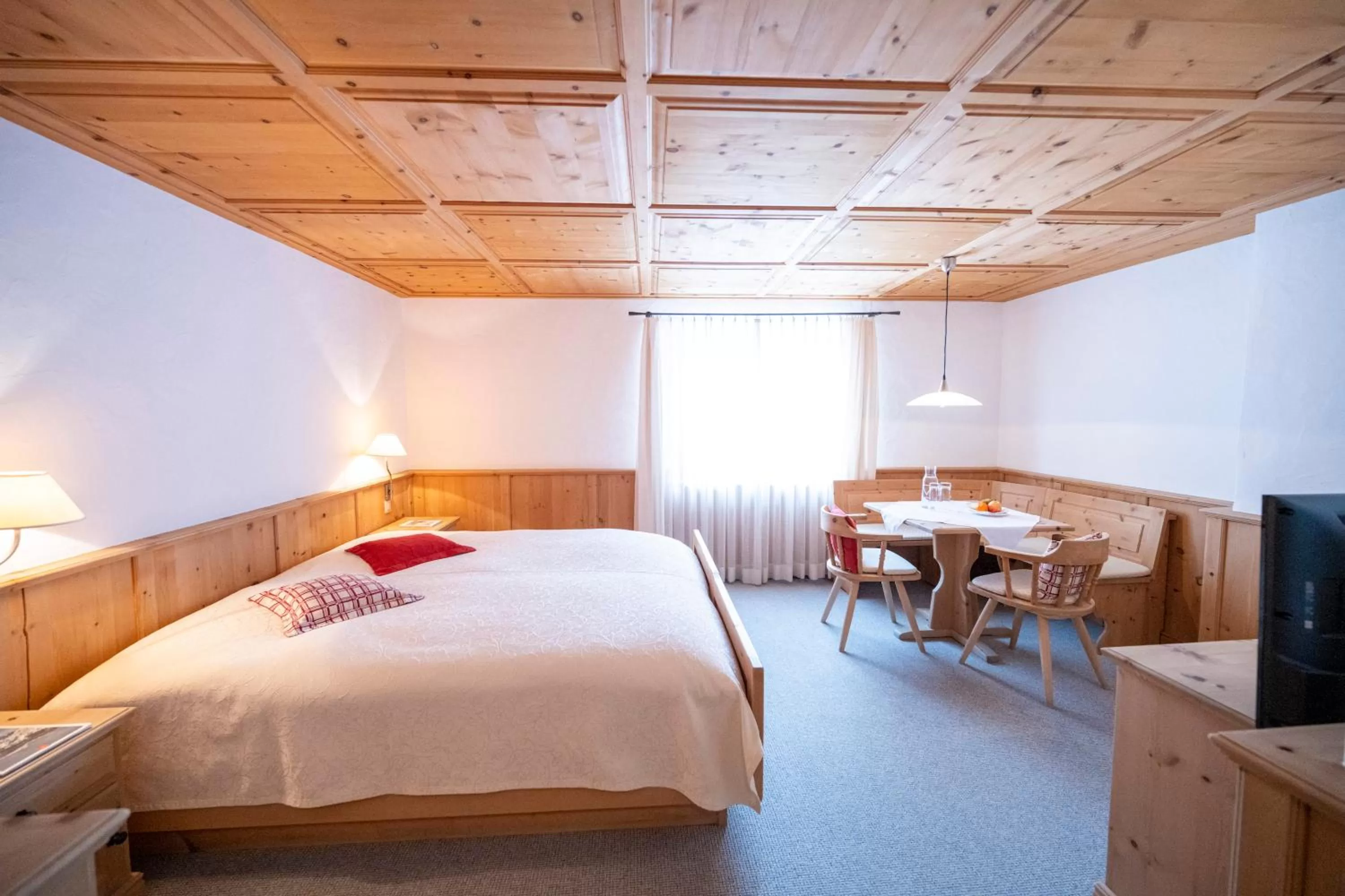 Bed in Hotel Engiadina