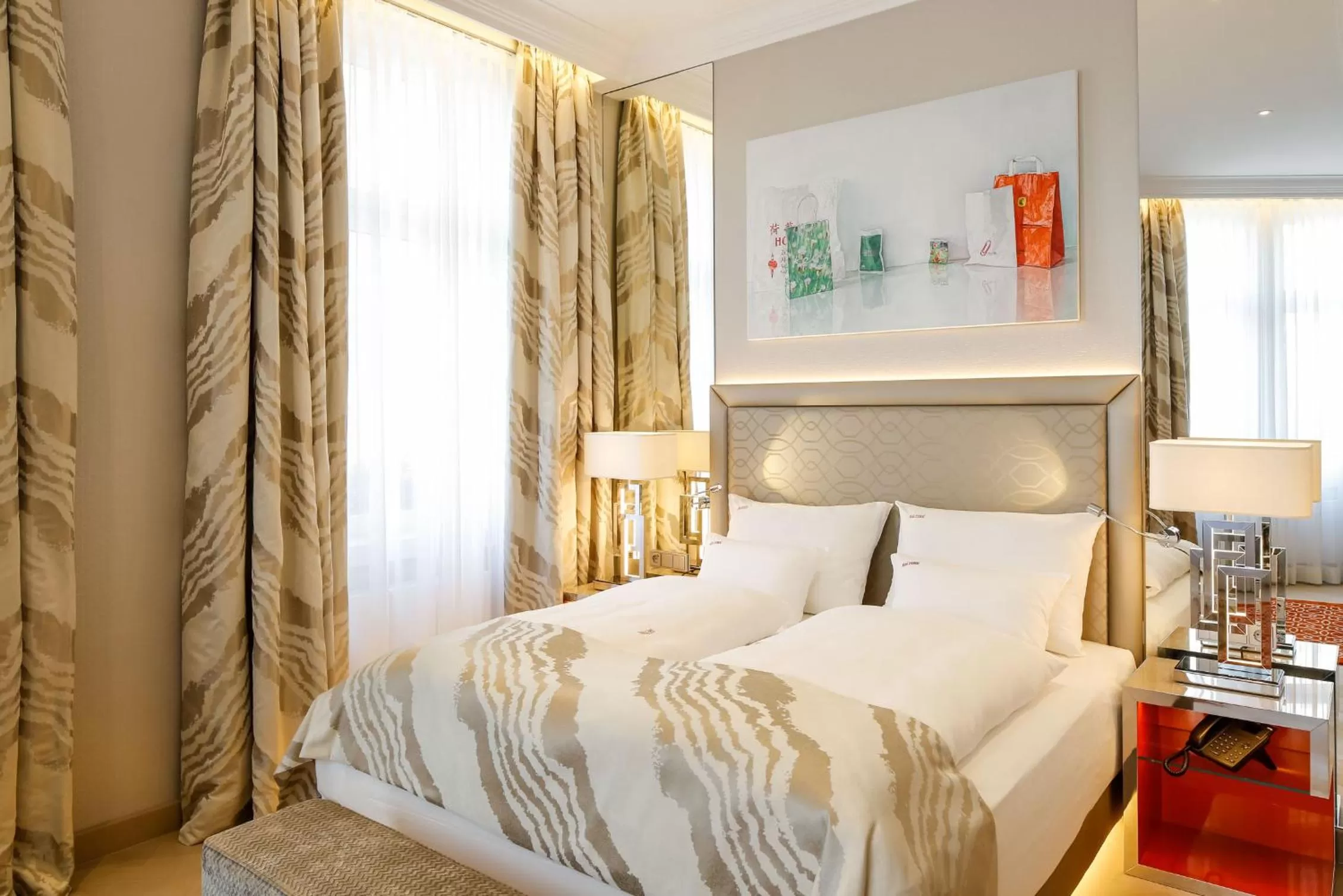 Bed in Boutiquehotel Das Tyrol