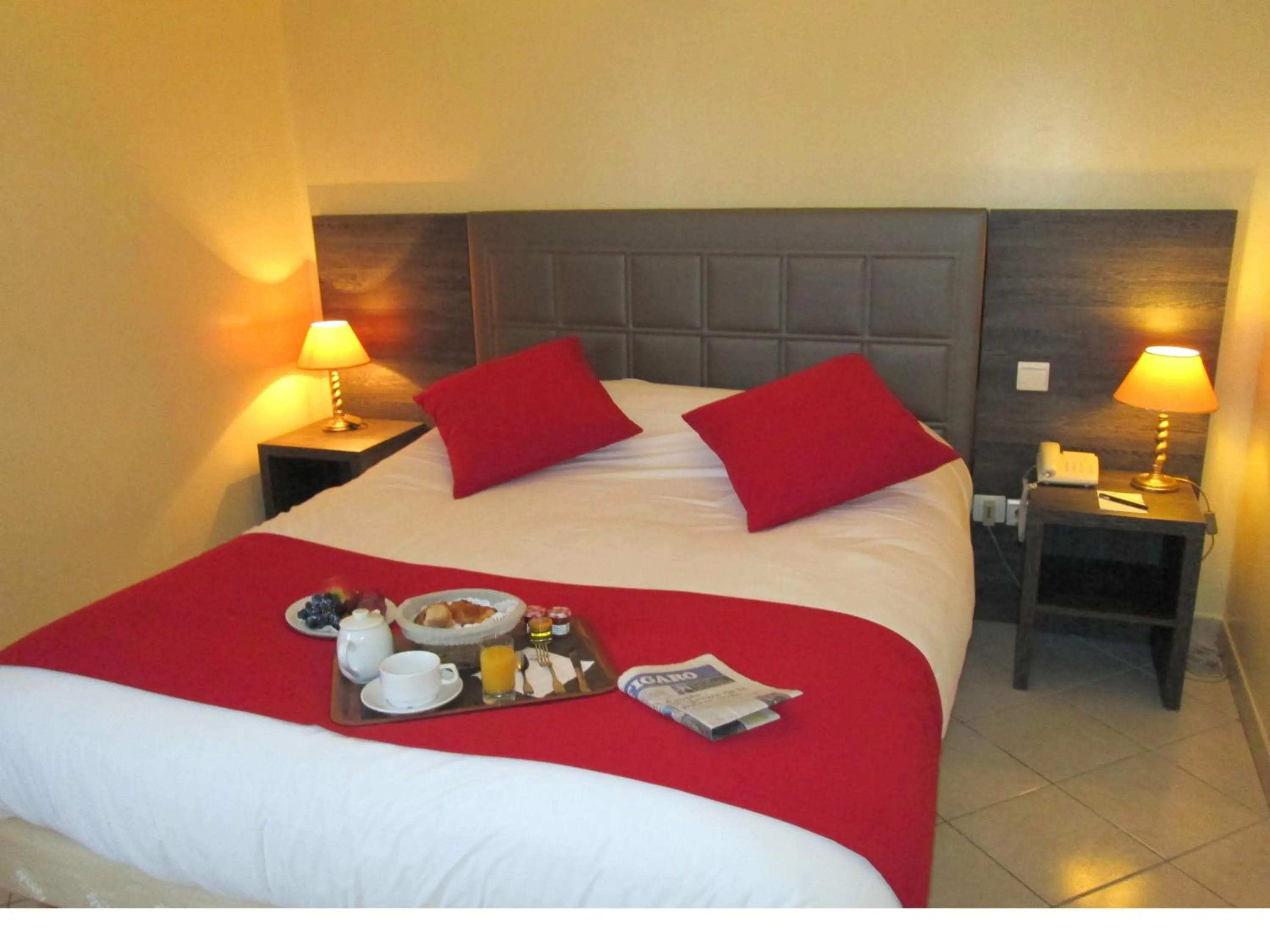 Bed in Hôtel Ariane