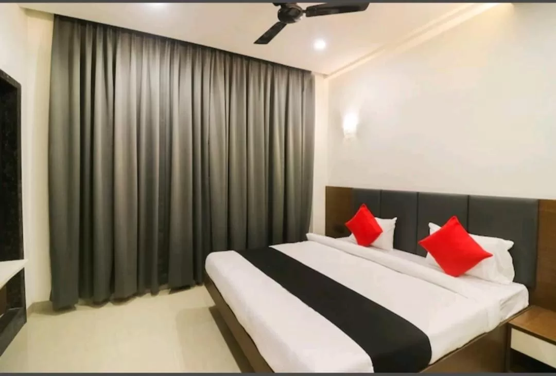 Bed in Hotel Nikhil Regency