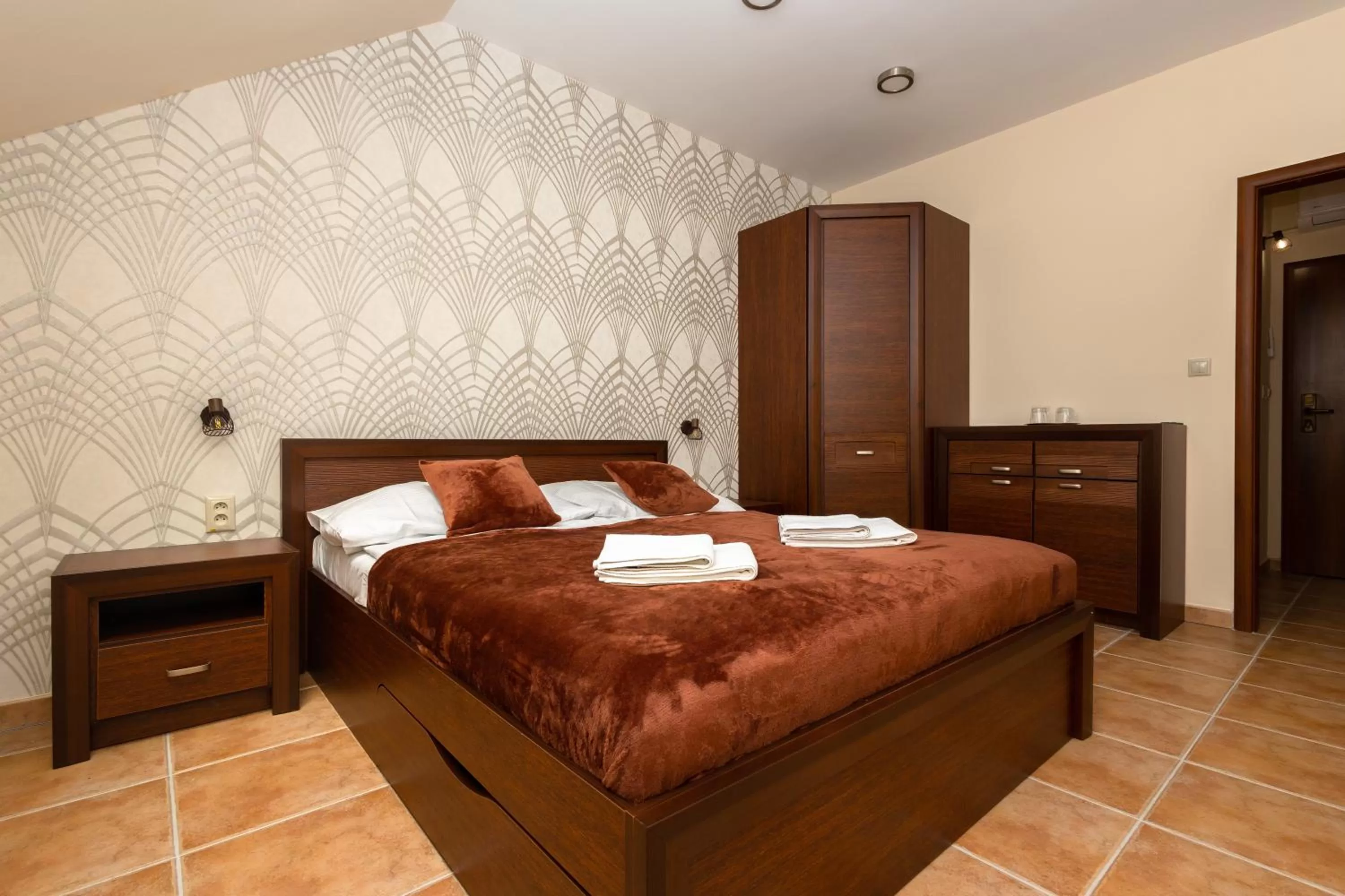 Photo of the whole room, Bed in Spa & Wellness Hotel Orchidea