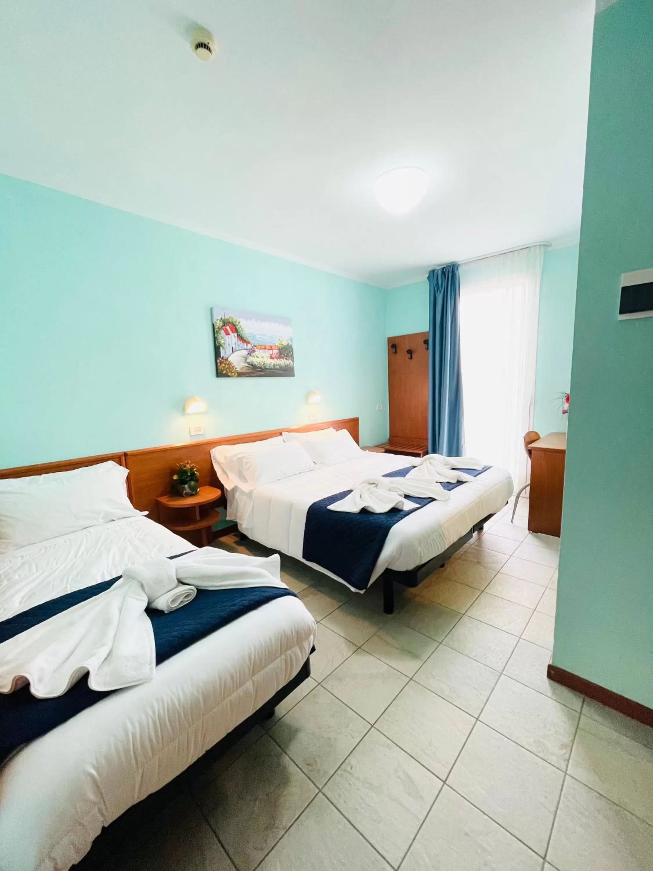 Triple Room in Hotel Blue Moon