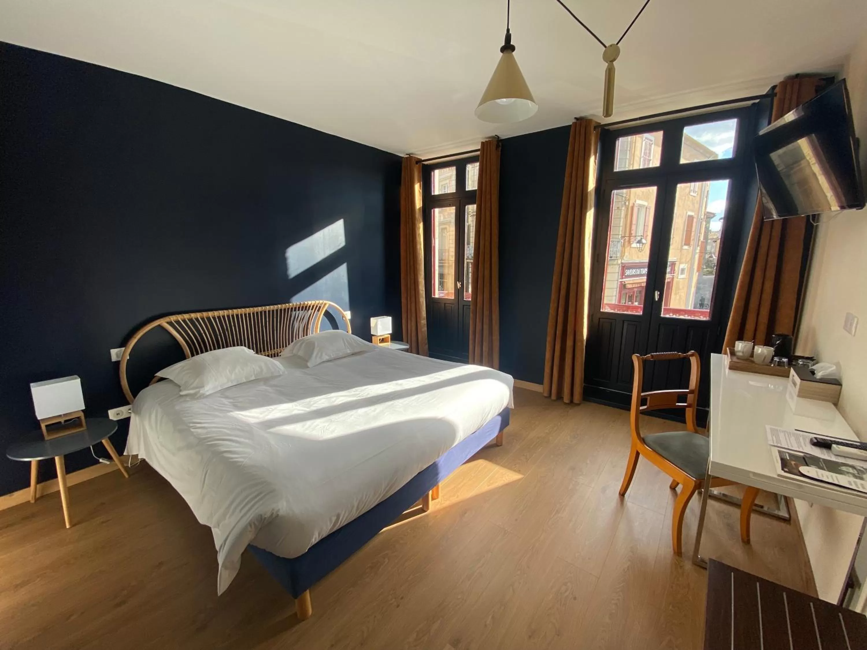 Bedroom in Le Miredames Hôtel-Bar