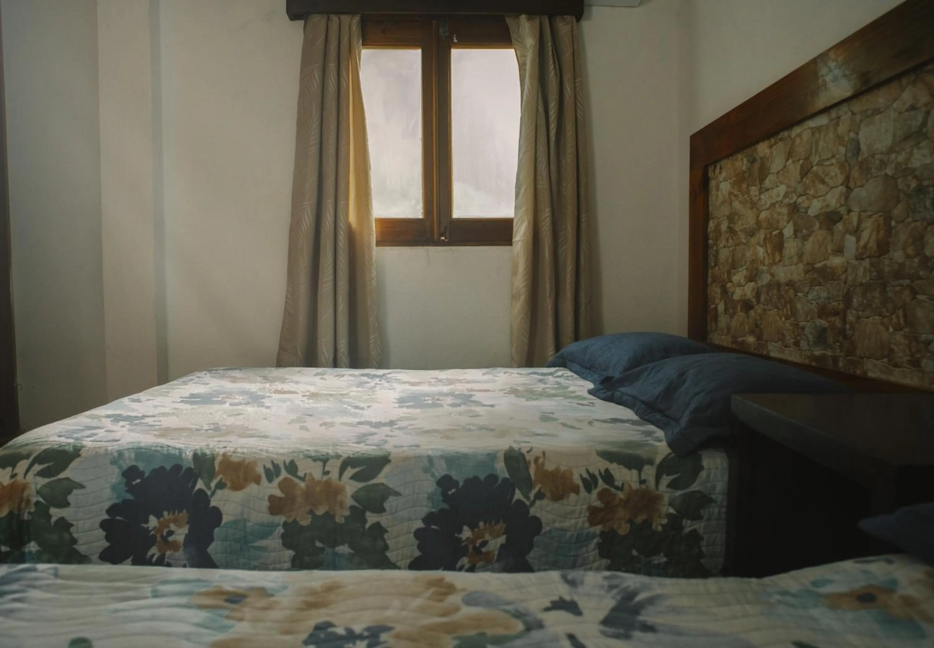 Bed in Hotel Posada San Agustin