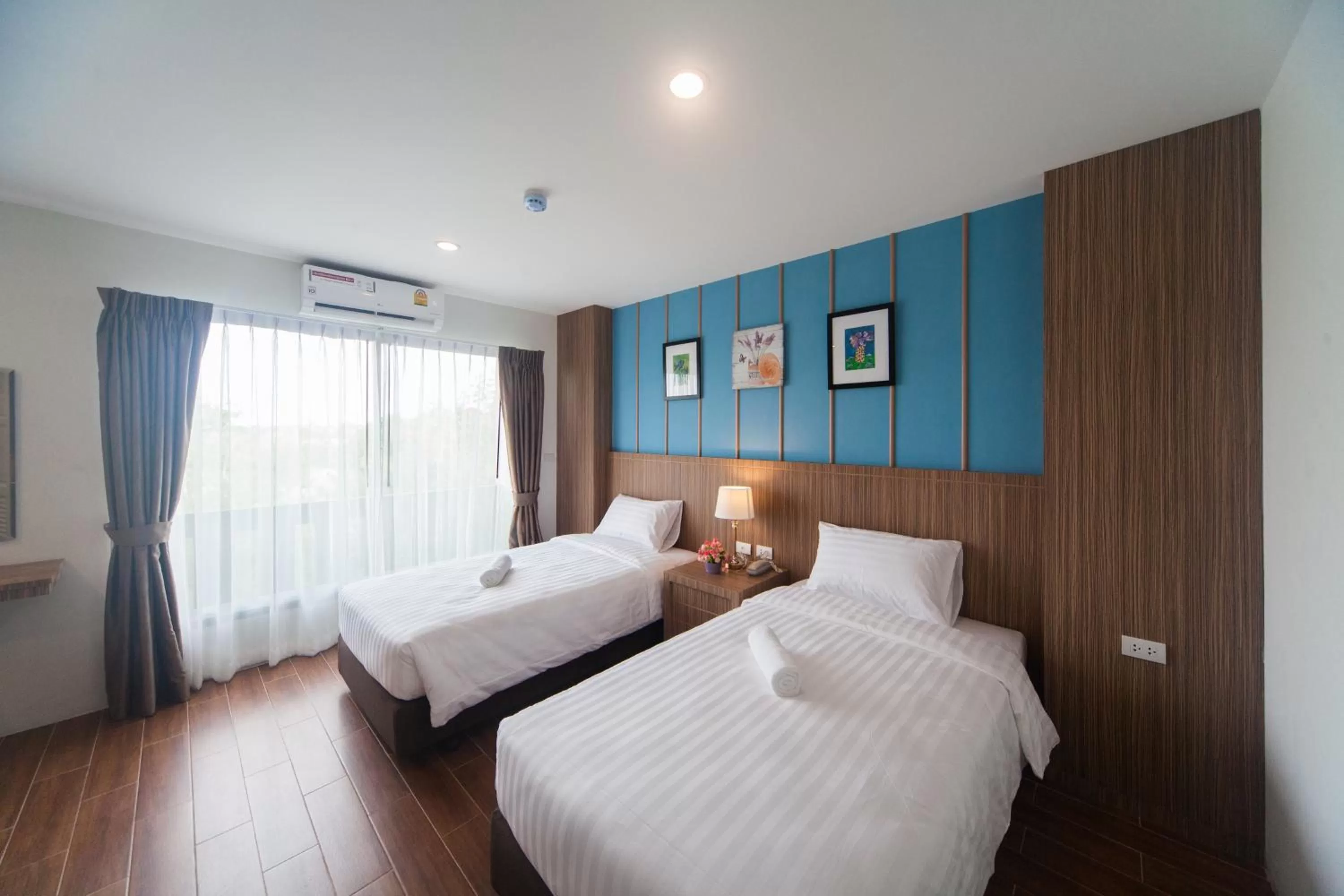 Bedroom, Bed in Anchan Laguna Hotel โรงแรมอัญชันลากูน่า